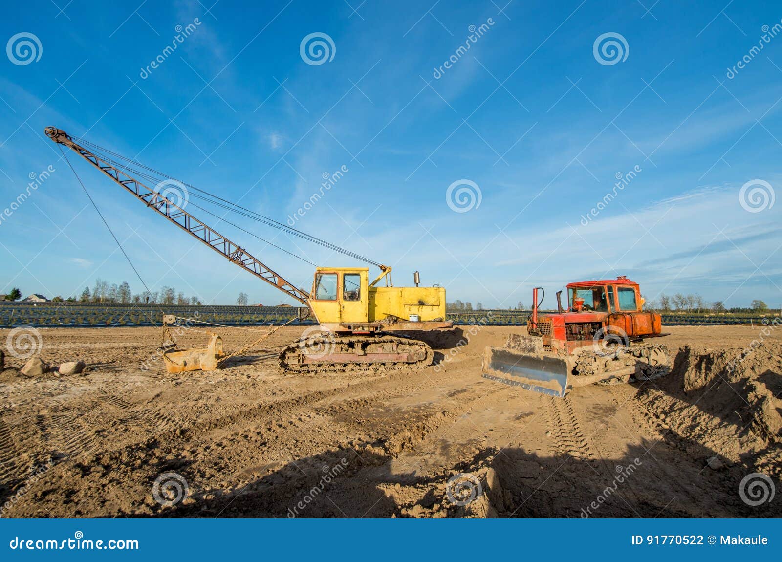 Tractor and excavator stock photo. Image of chain, machine 91770522