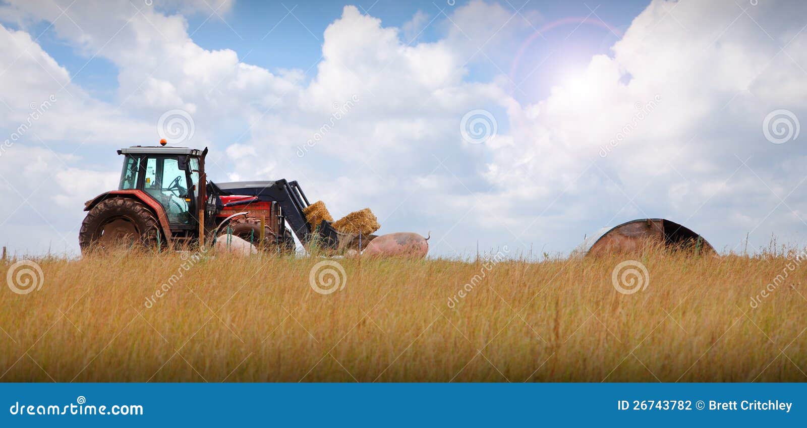 tractor on farm landscape