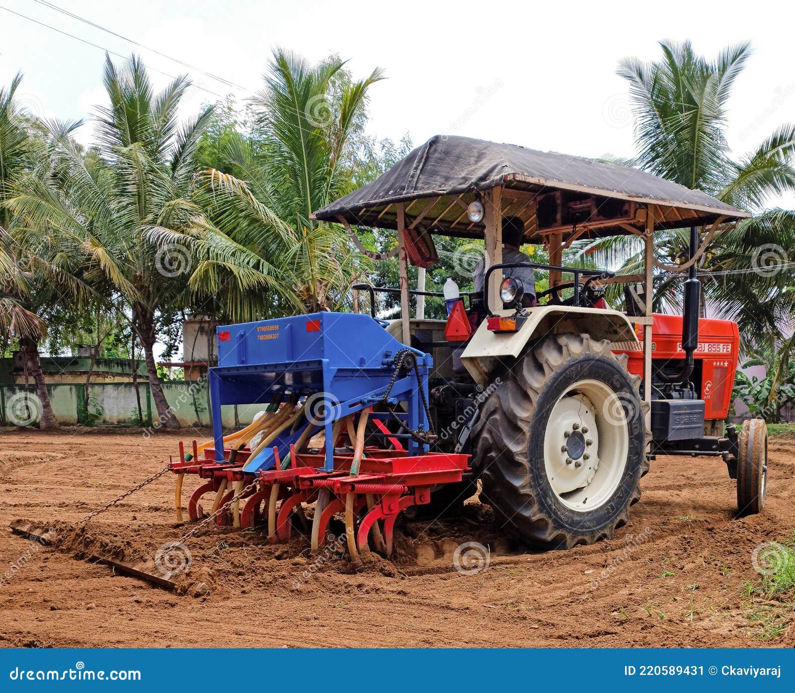 Tractor in a Field, Indian Farmer, Tamil Nadu Farmer. Editorial Photo