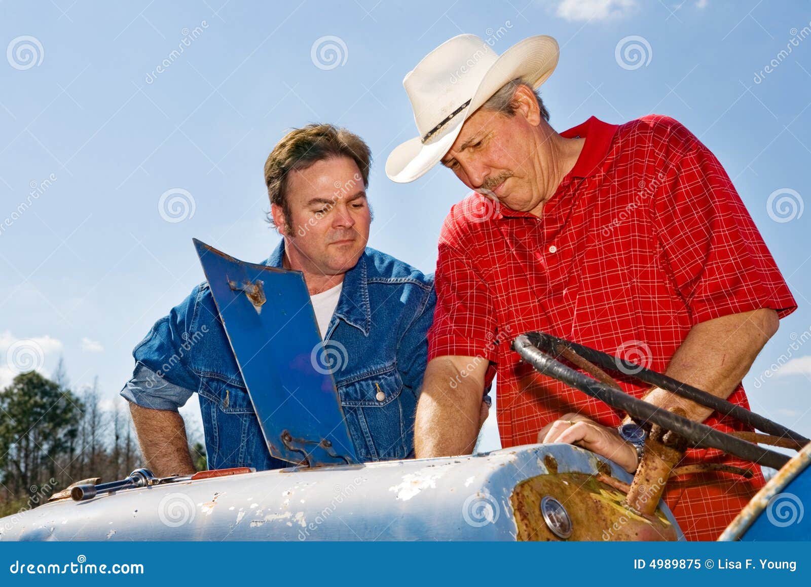 Tractor Repair stock image. Image of masculine, field 4989875