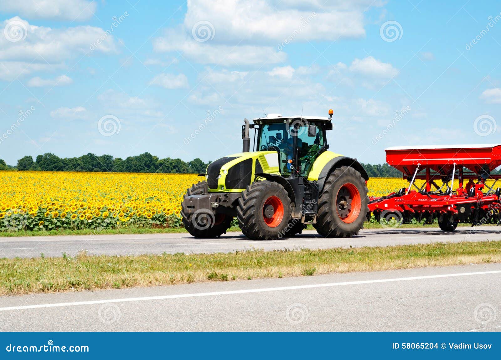 Tractor on the road stock photo. Image of agriculture 58065204