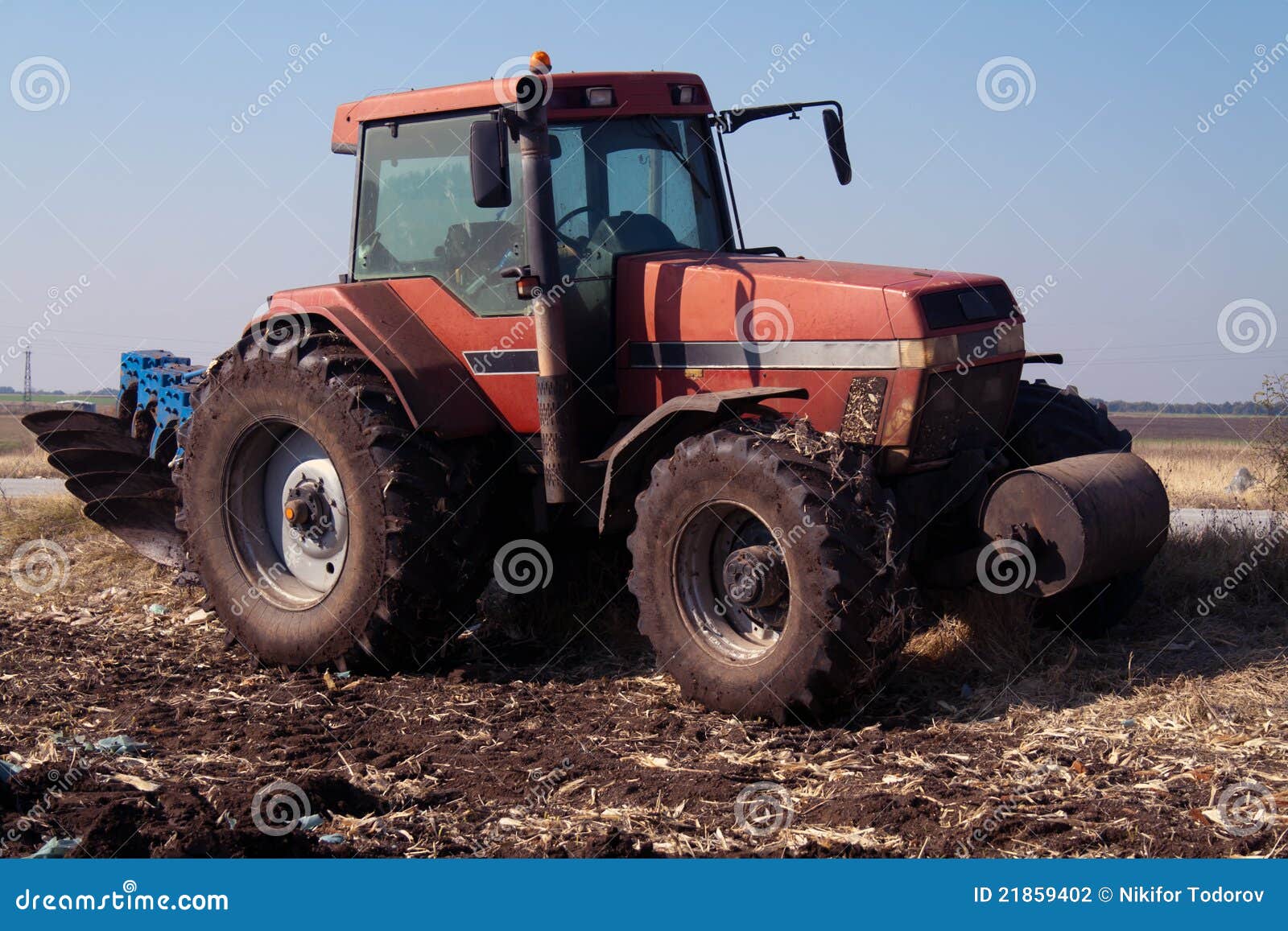 Tractor at work on farm stock photo. Image of natural 21859402