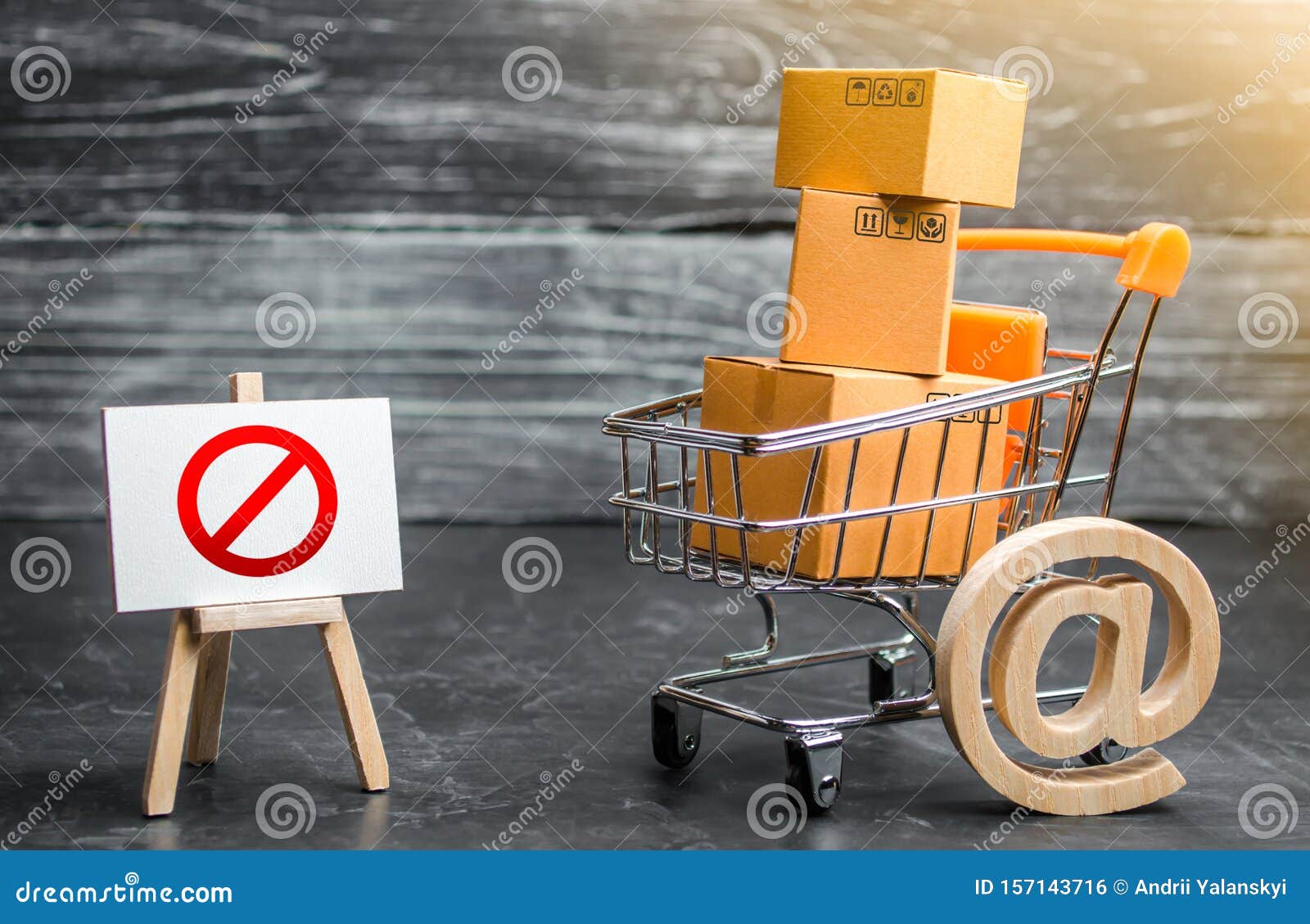 trading cart with boxes and an easel with a prohibition  no. internet trade online shopping ban. restriction on importation
