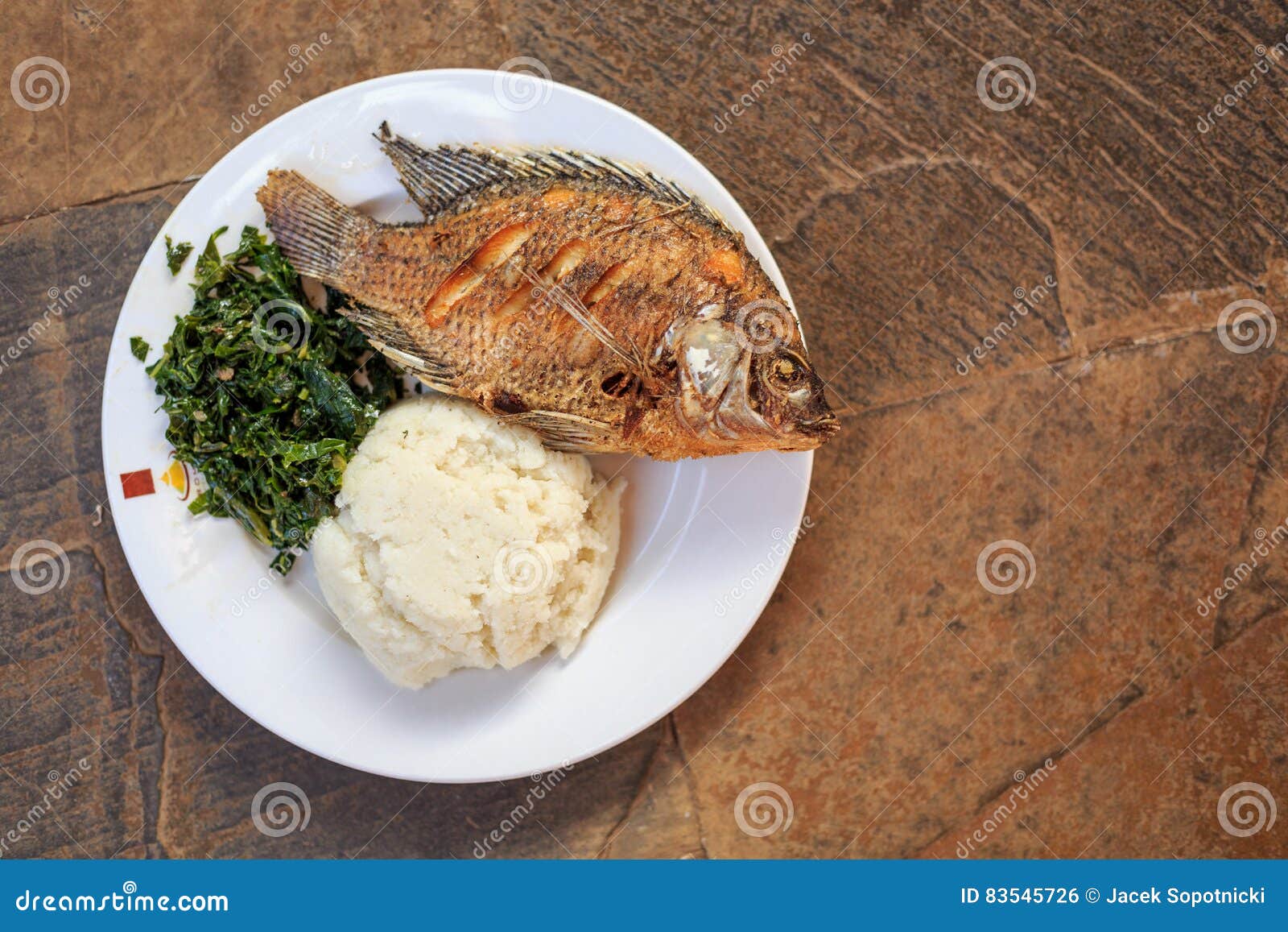 Traditional African Food Ugali Fish And Greens Royalty Free Stock traditional-african-food-ugali-fish-and-greens-royalty-free-stock
