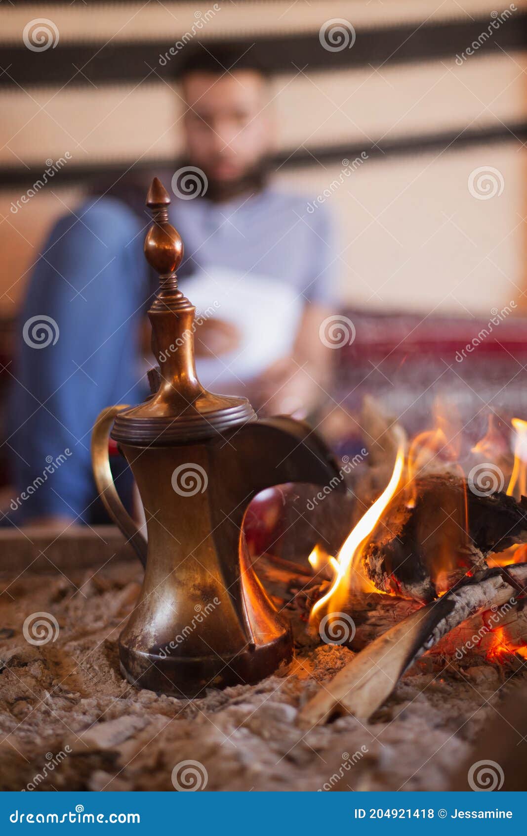Traditional Arabic Coffee Pot Named Dallah In Fireplace Stock Photo