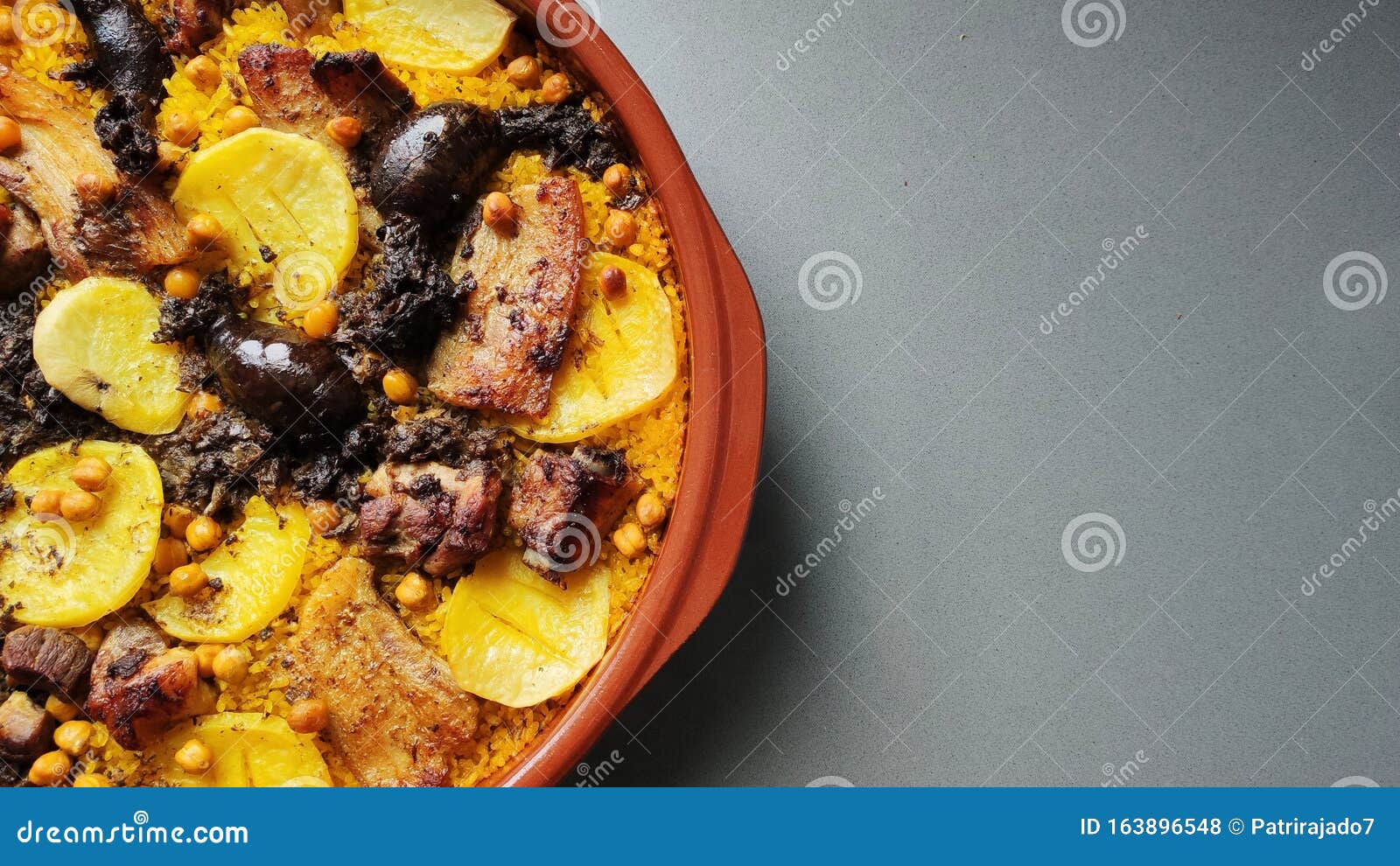 traditional `arroz al horno` from valencia, spain. baked rice