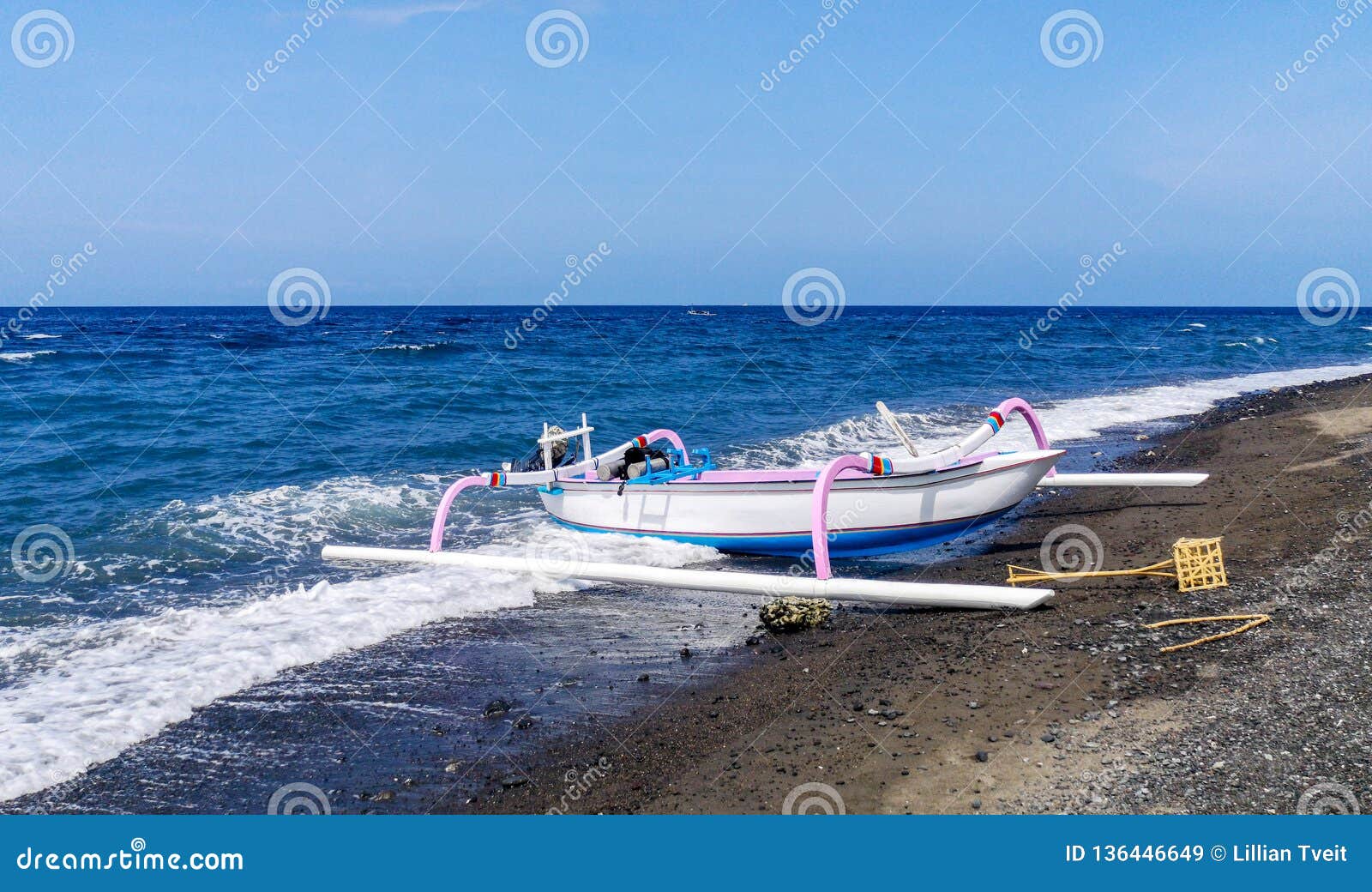 jukung, the traditional balinese fishing boat, at the beach in amed. bali, indonesia