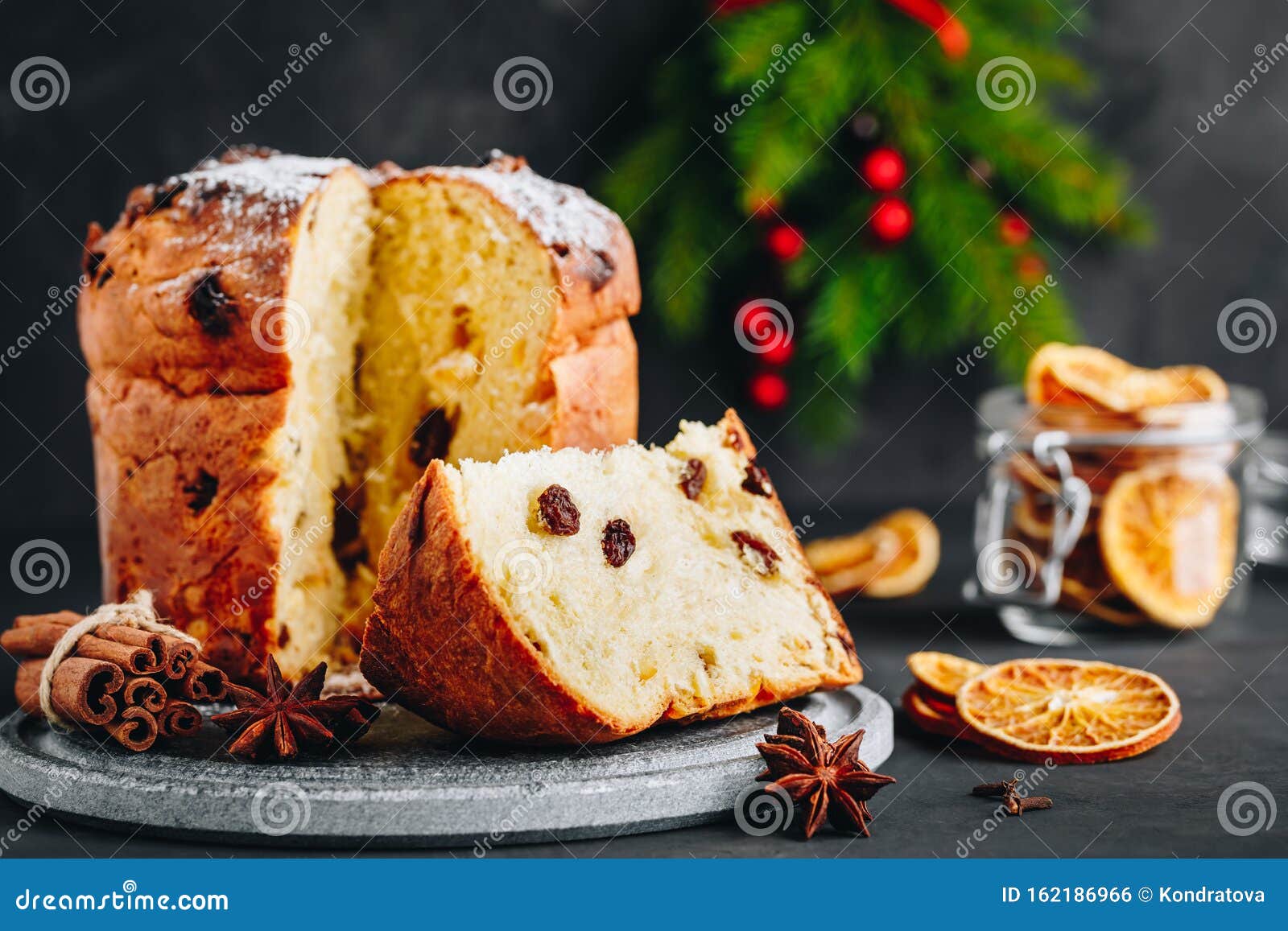 Traditional Christmas Panettone Cake with Dried Fruits on Dark Stone ...