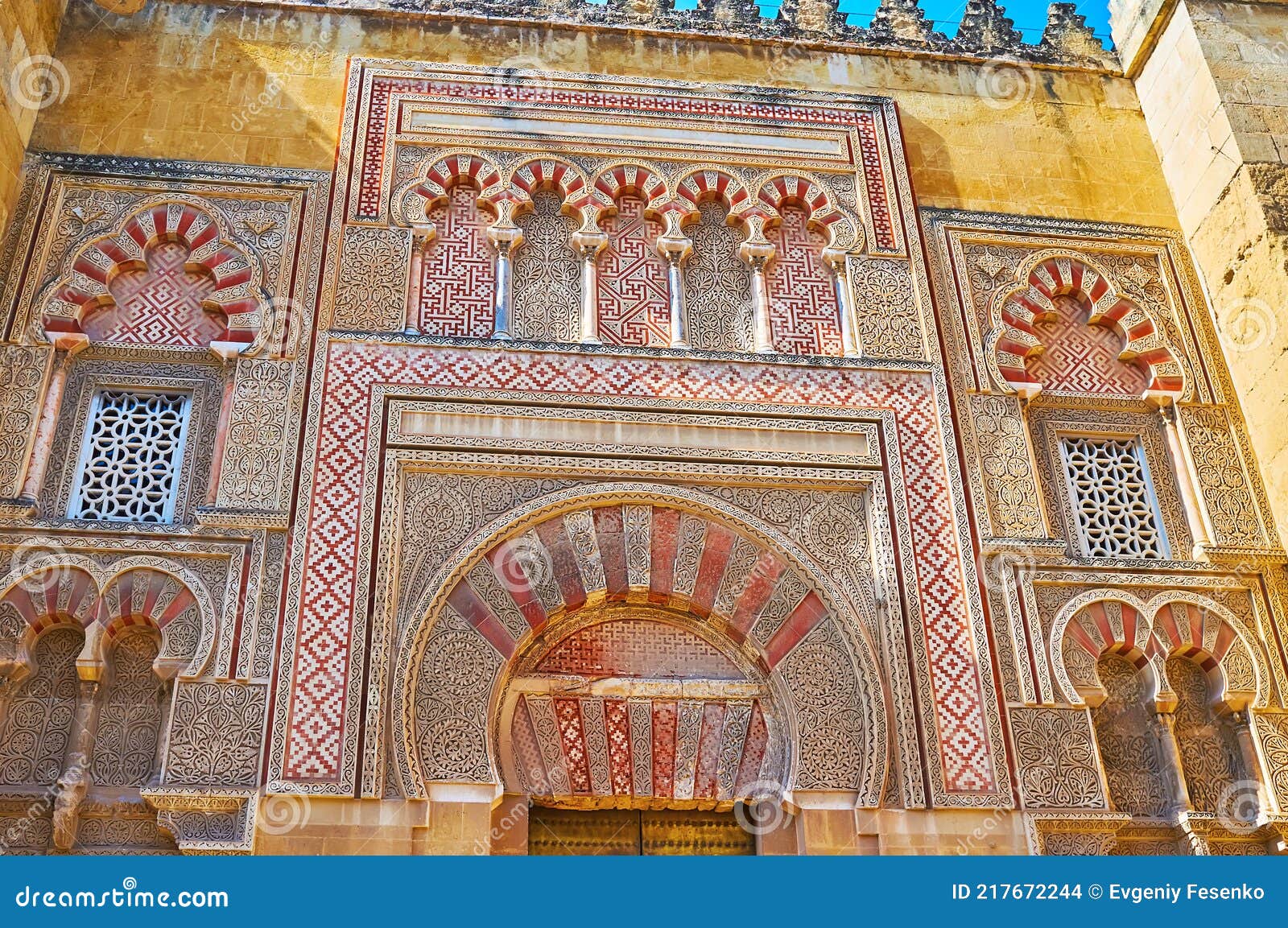 traditional decorations of puerta del baptisterio gate, mezquita, cordoba, spain