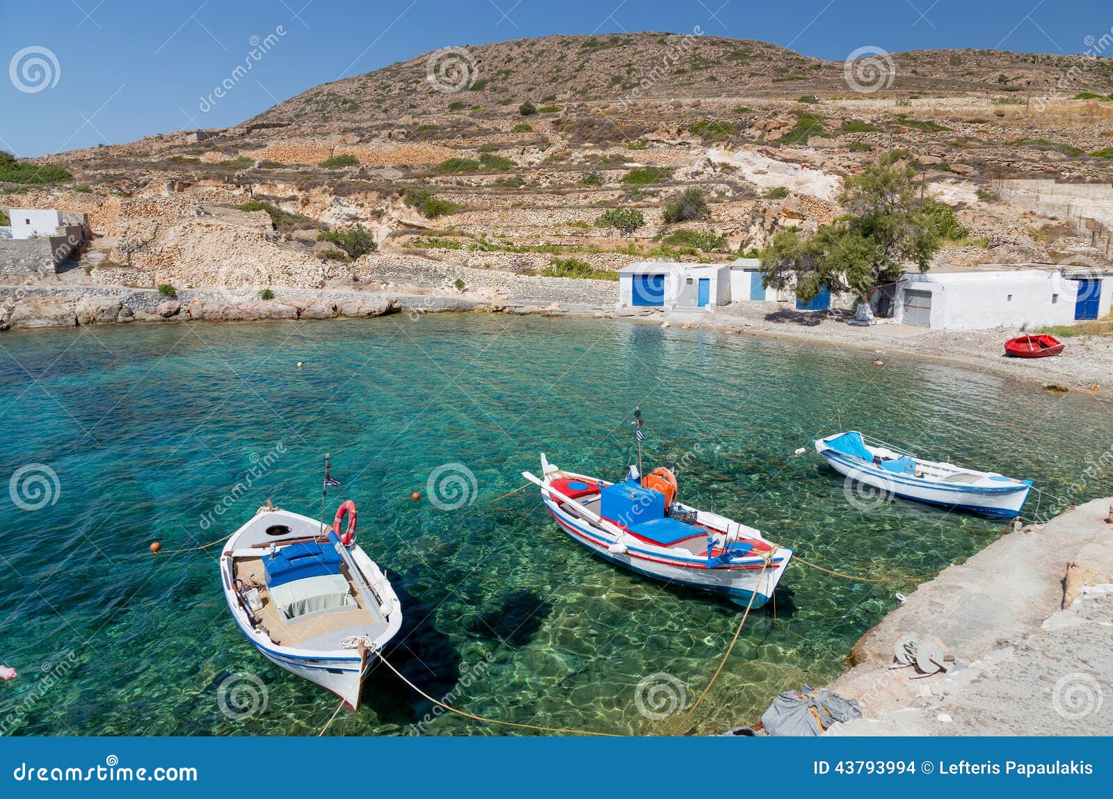 traditional fishing boats in ag. nikolas bay, kimolos island, cyclades, greece