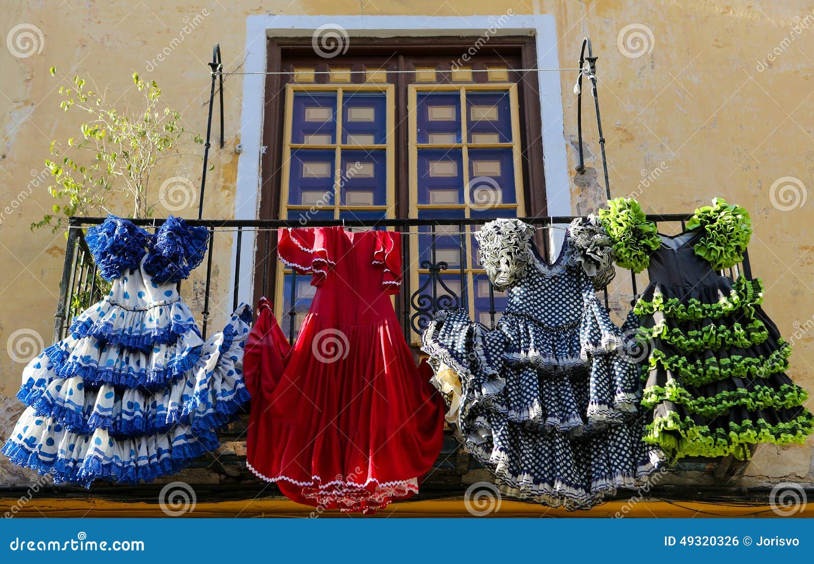 traditional flamenco dresses at a house in malaga, andalusia, sp