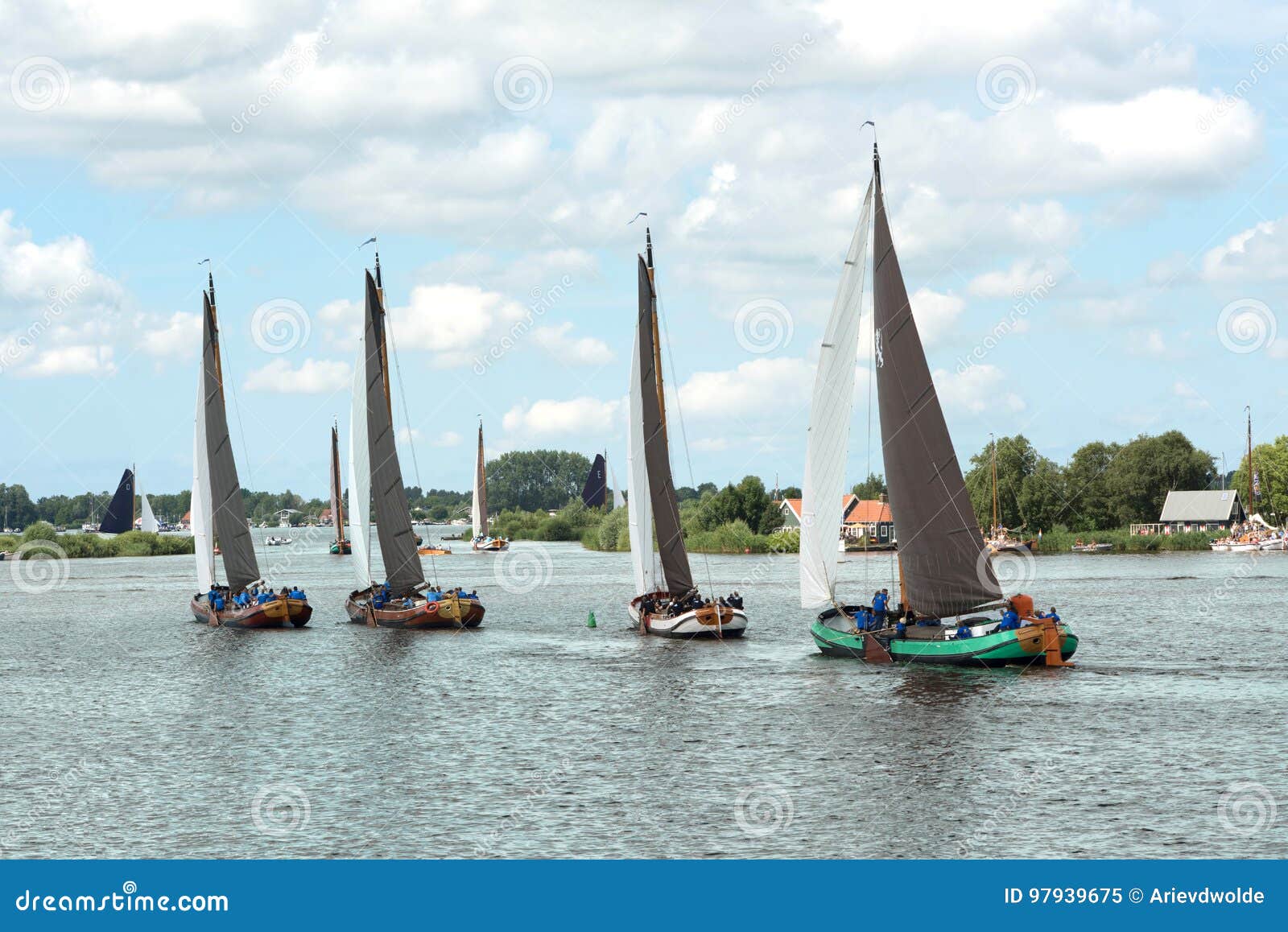 traditional frisian wooden sailing ships in a yearly competition