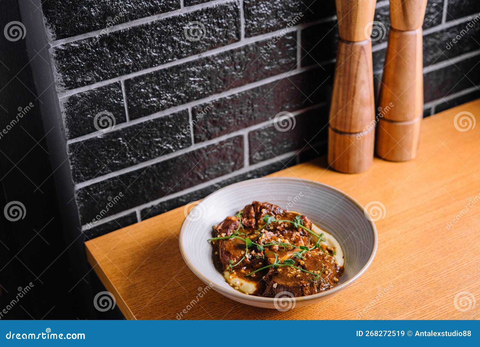 Traditional German Braised Veal Cheeks in Brown Sauce with Mashed