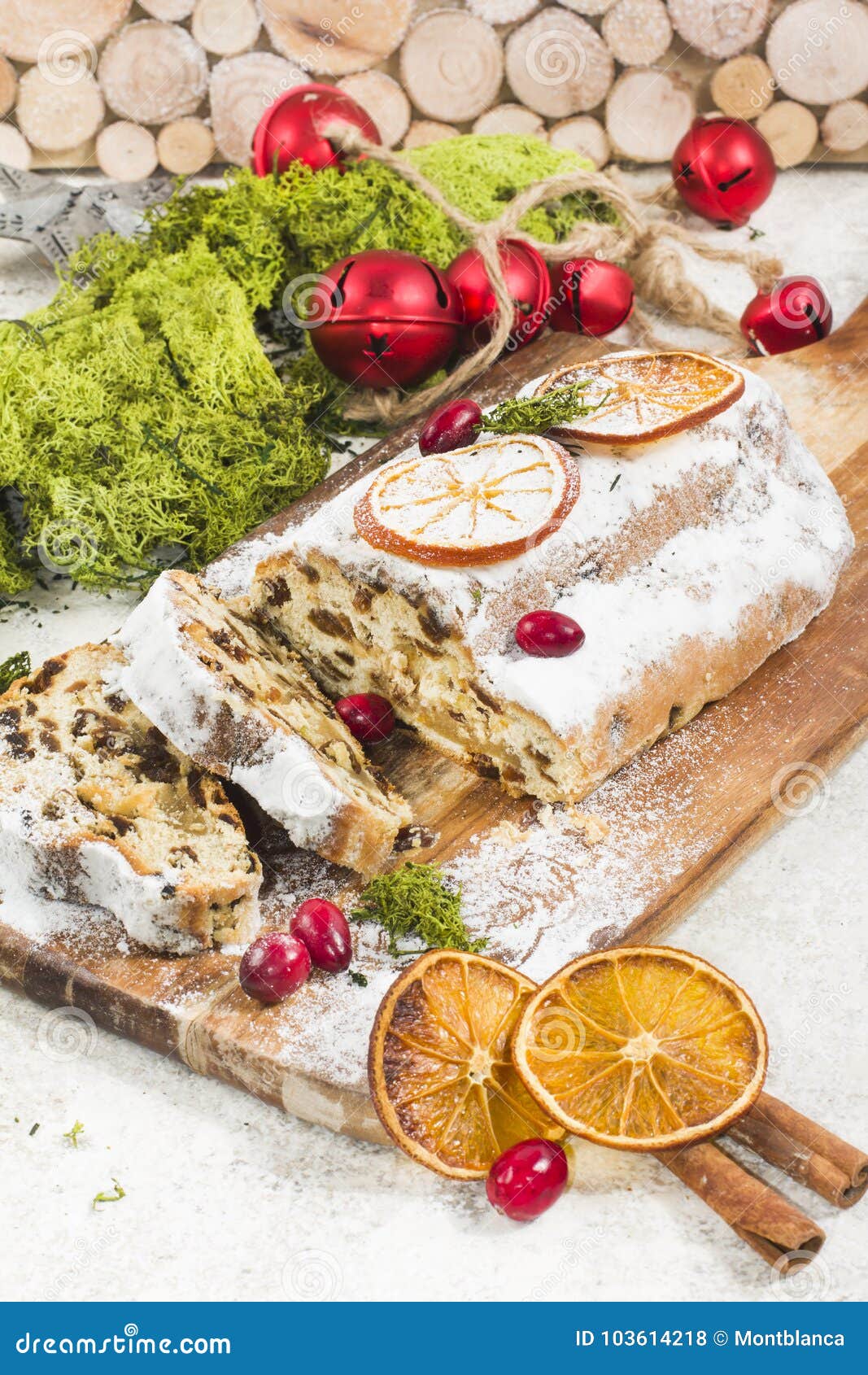 Traditional German Christmas Cake with Raisins and Marzipan. Sliced