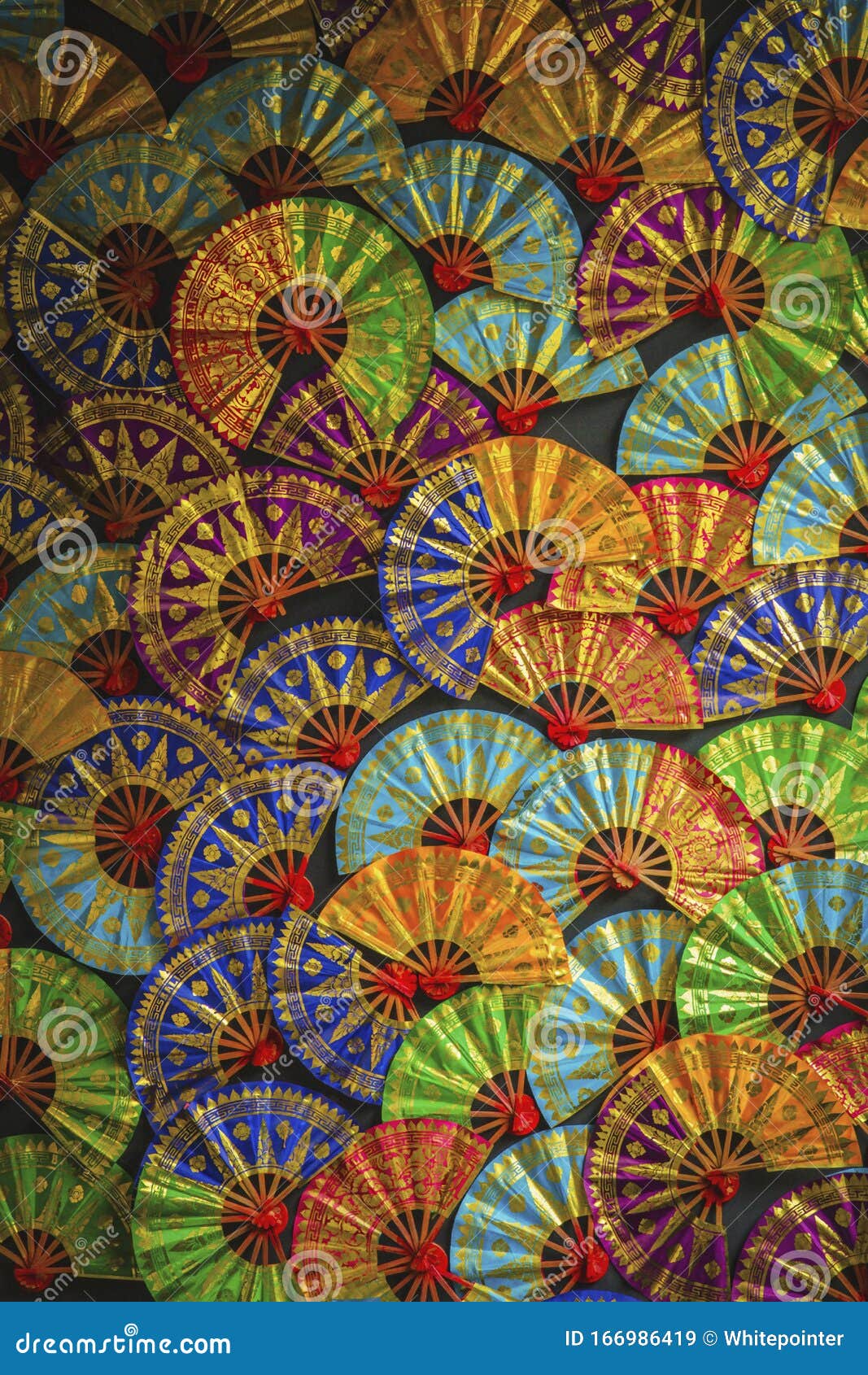 Traditional Hand Fan on Display As a Photography Background Stock Image -  Image of dark, floral: 166986419