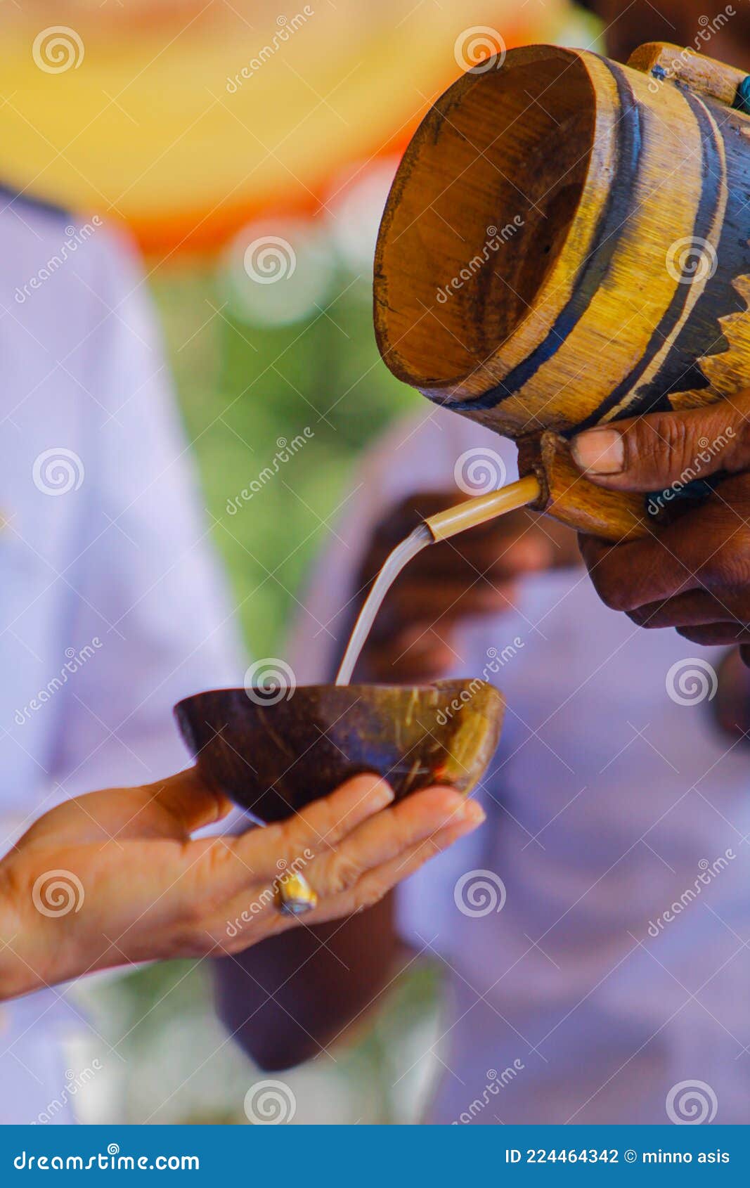 a traditional jug and glass that made of bamboo and coconut. these tools usually used in a traditional ceremonial