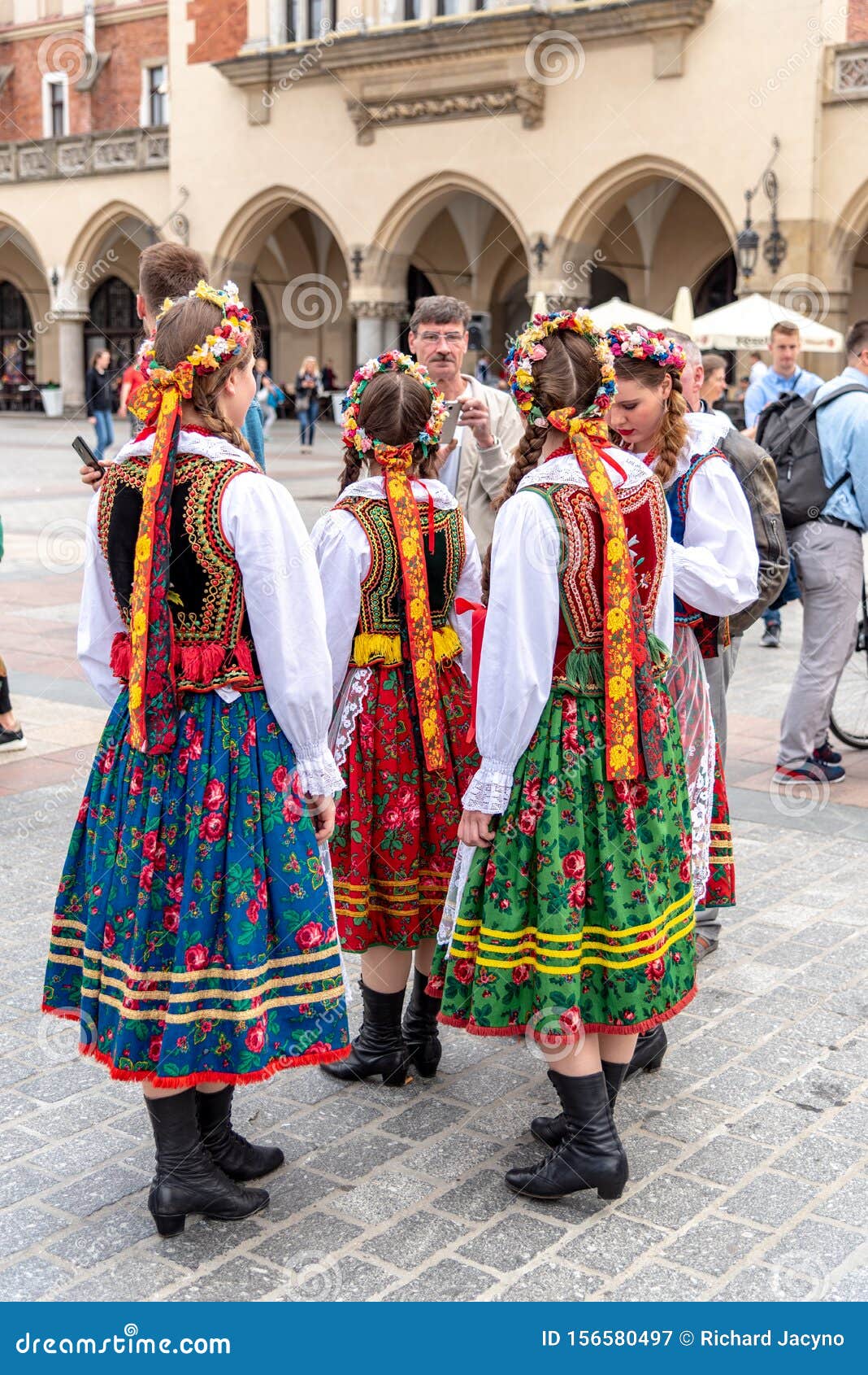 Traditional Polish Folk Costumes On Parade In Krakow Main Market