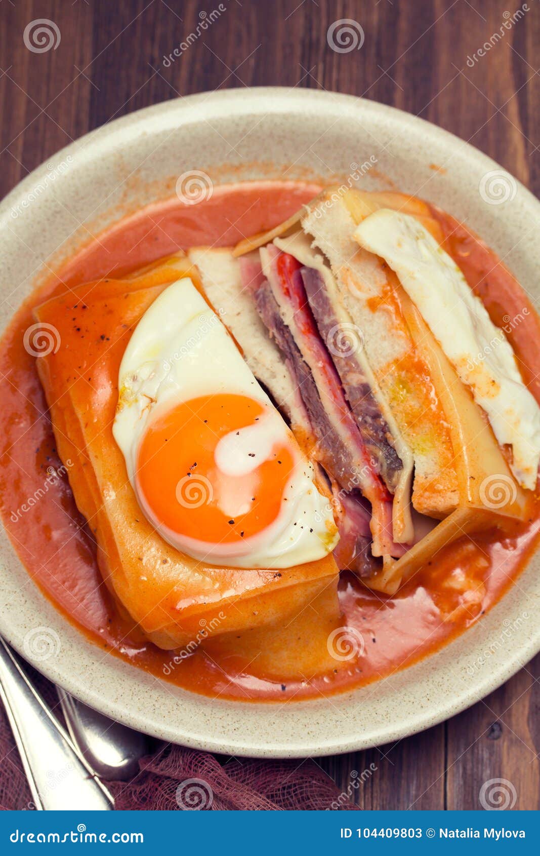 Traditional Portuguese Sandwich with Sauce Francesinha on Dish Stock ...