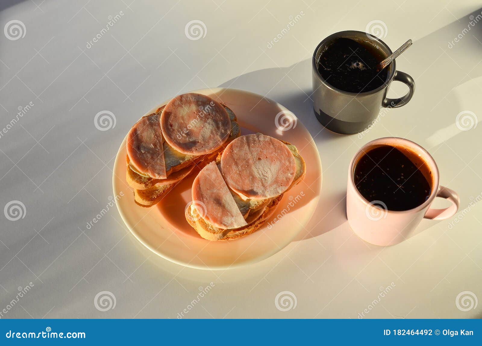 Traditional Russian Breakfast with Two Cup of Coffee and Bread with  Sausages at White Table Stock Photo - Image of beans, sandwich: 182464492