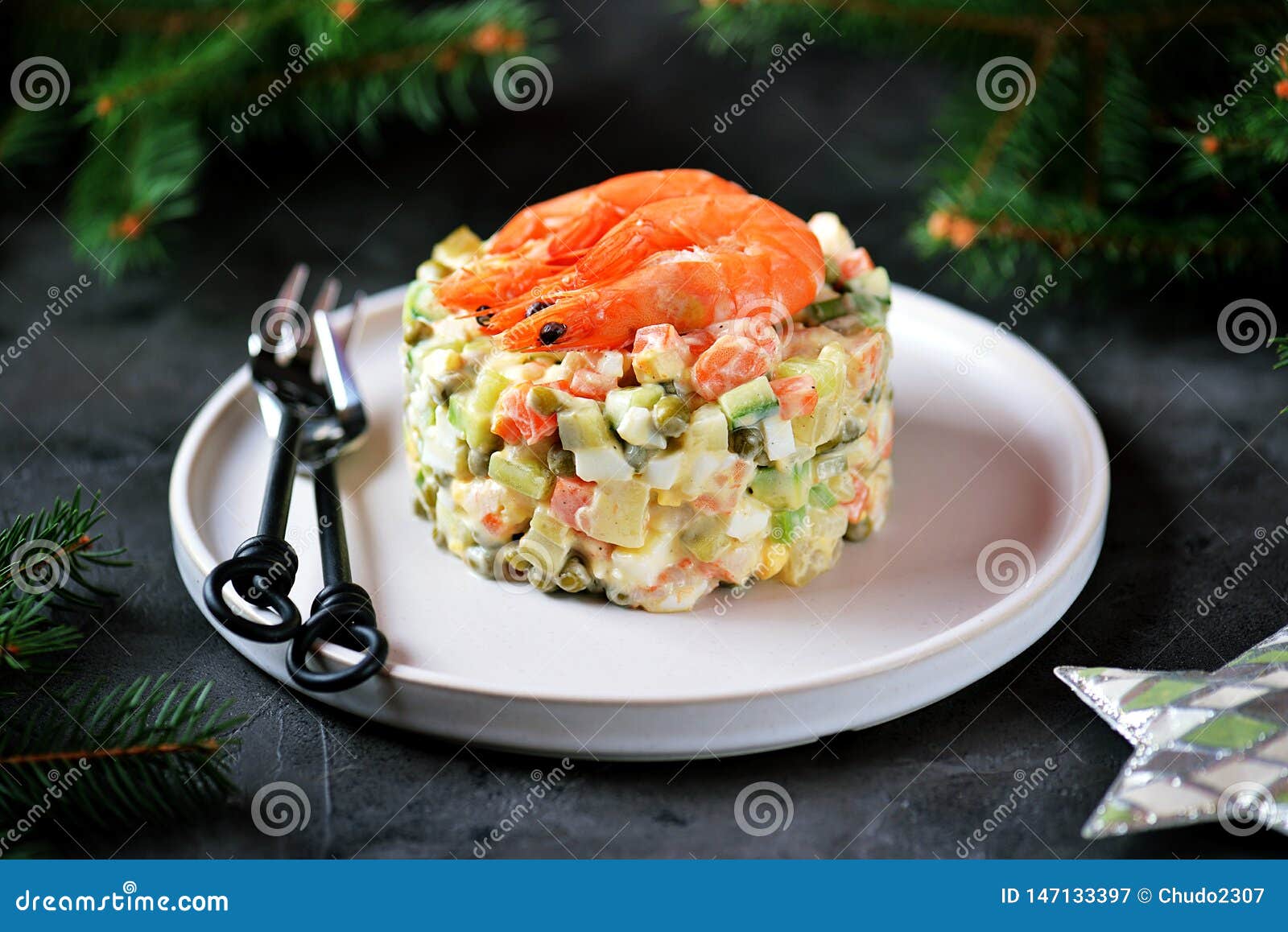 Traditional Russian Salad `Olivier` with Shrimps and Avocado. Christmas ...