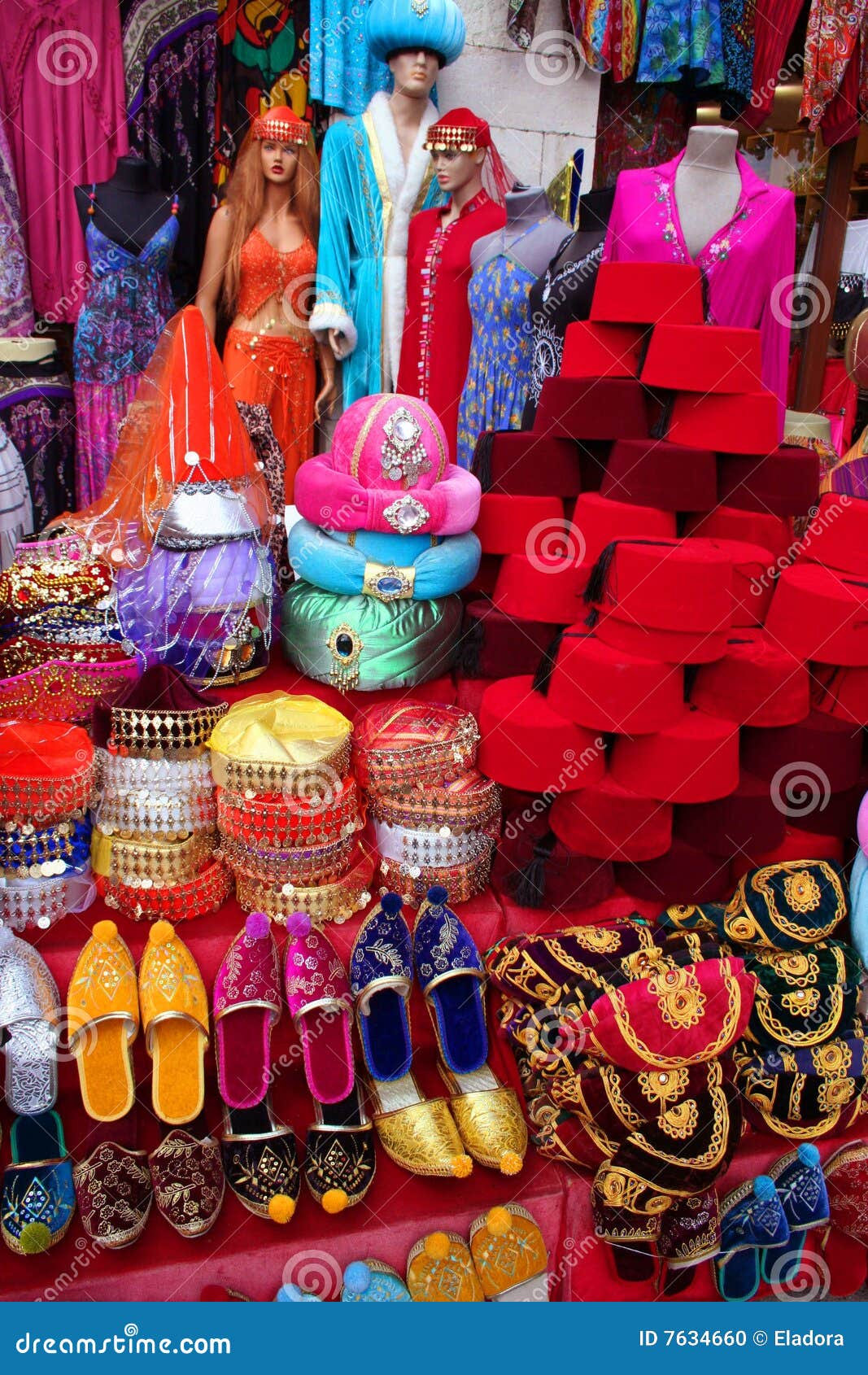 traditional slippers, fez and caftan on display
