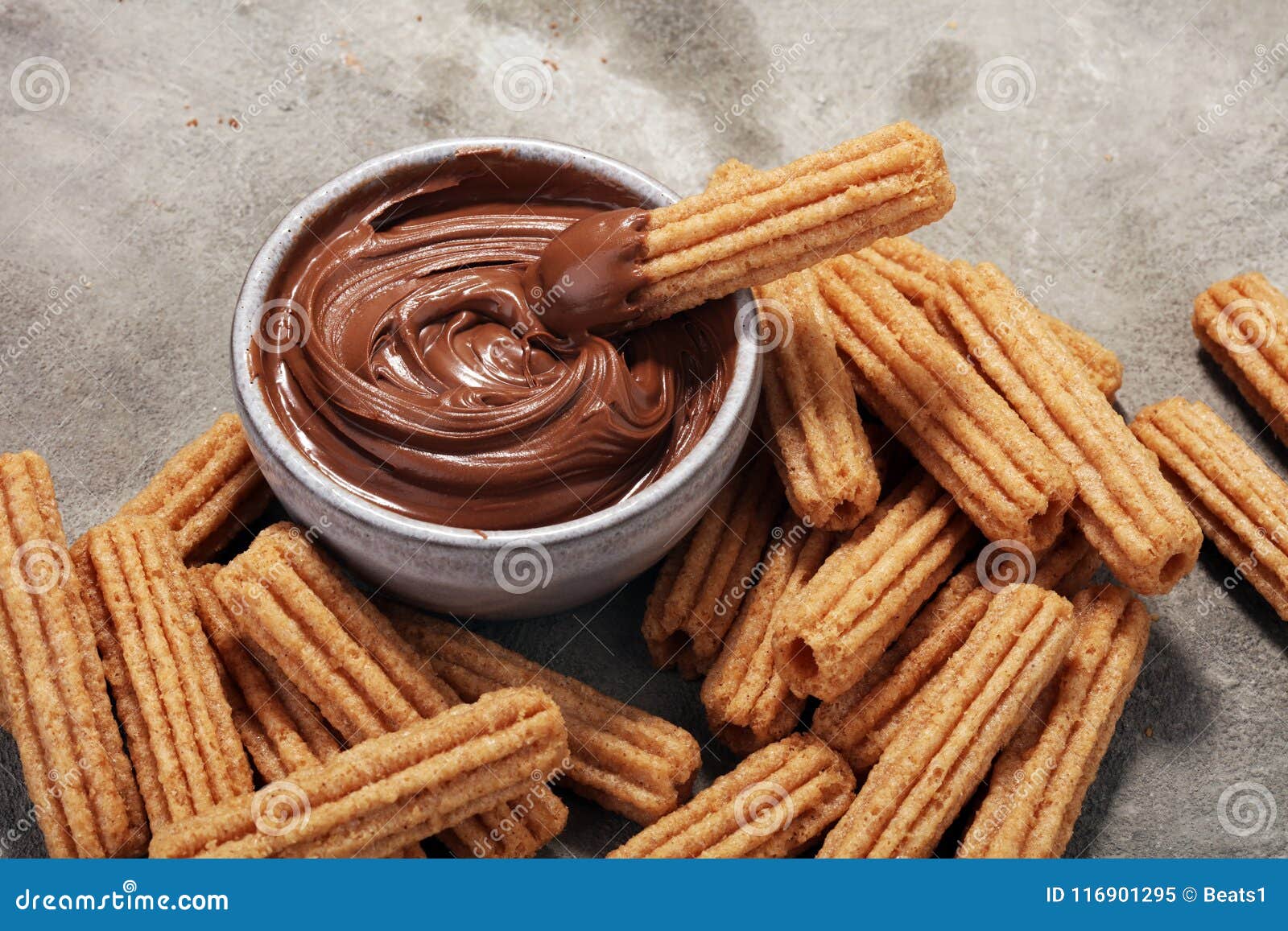 Traditional Spanish Dessert Churros with Sugar and Chocolate Stock