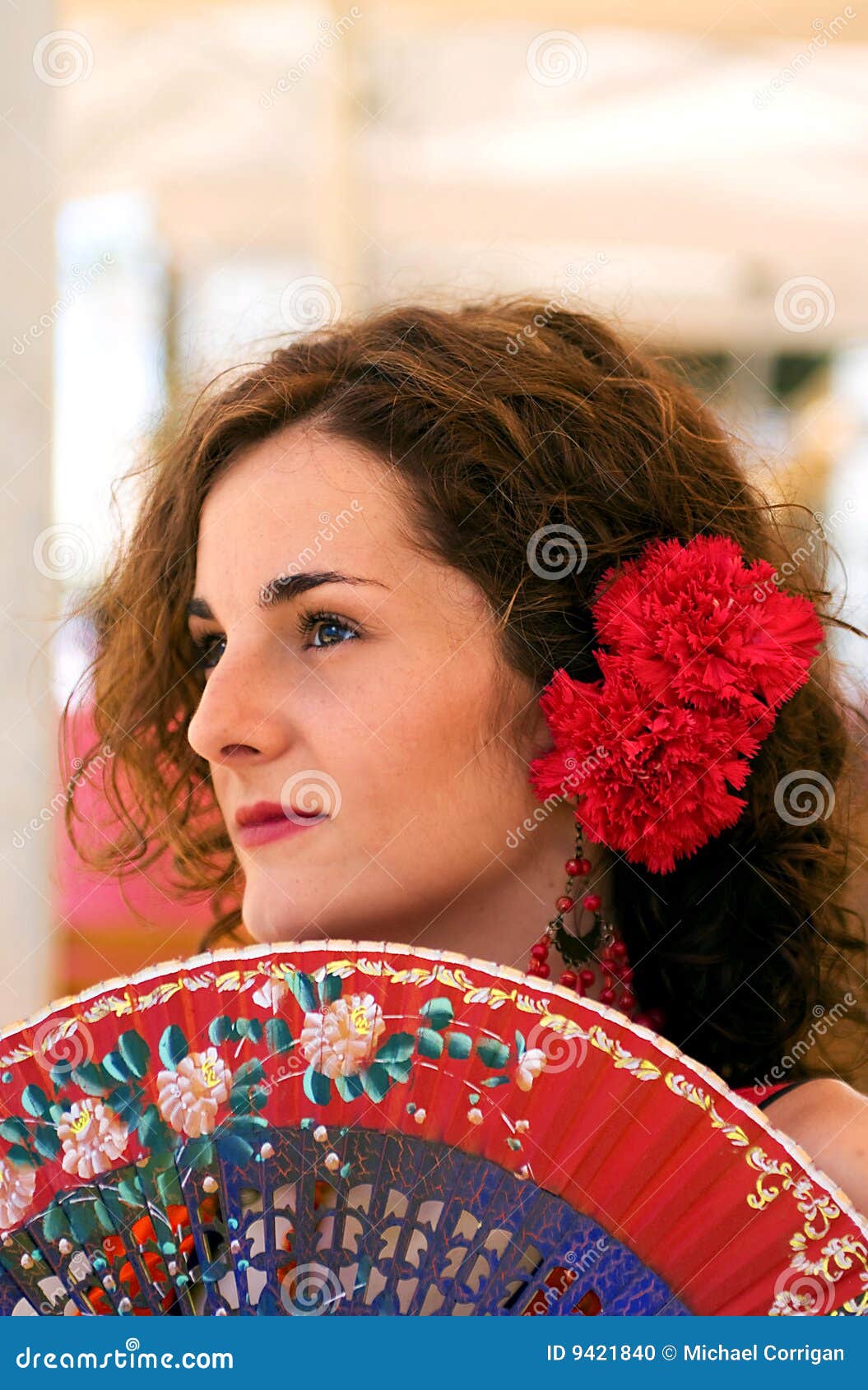 traditional spanish woman with red fan