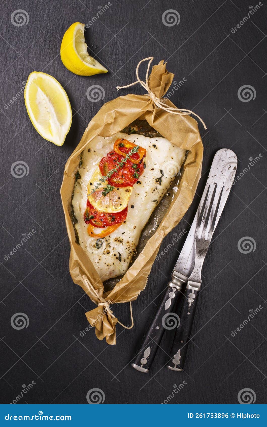 Traditional Steamed Cod Fish Fillet with Vegetable and Herbs in