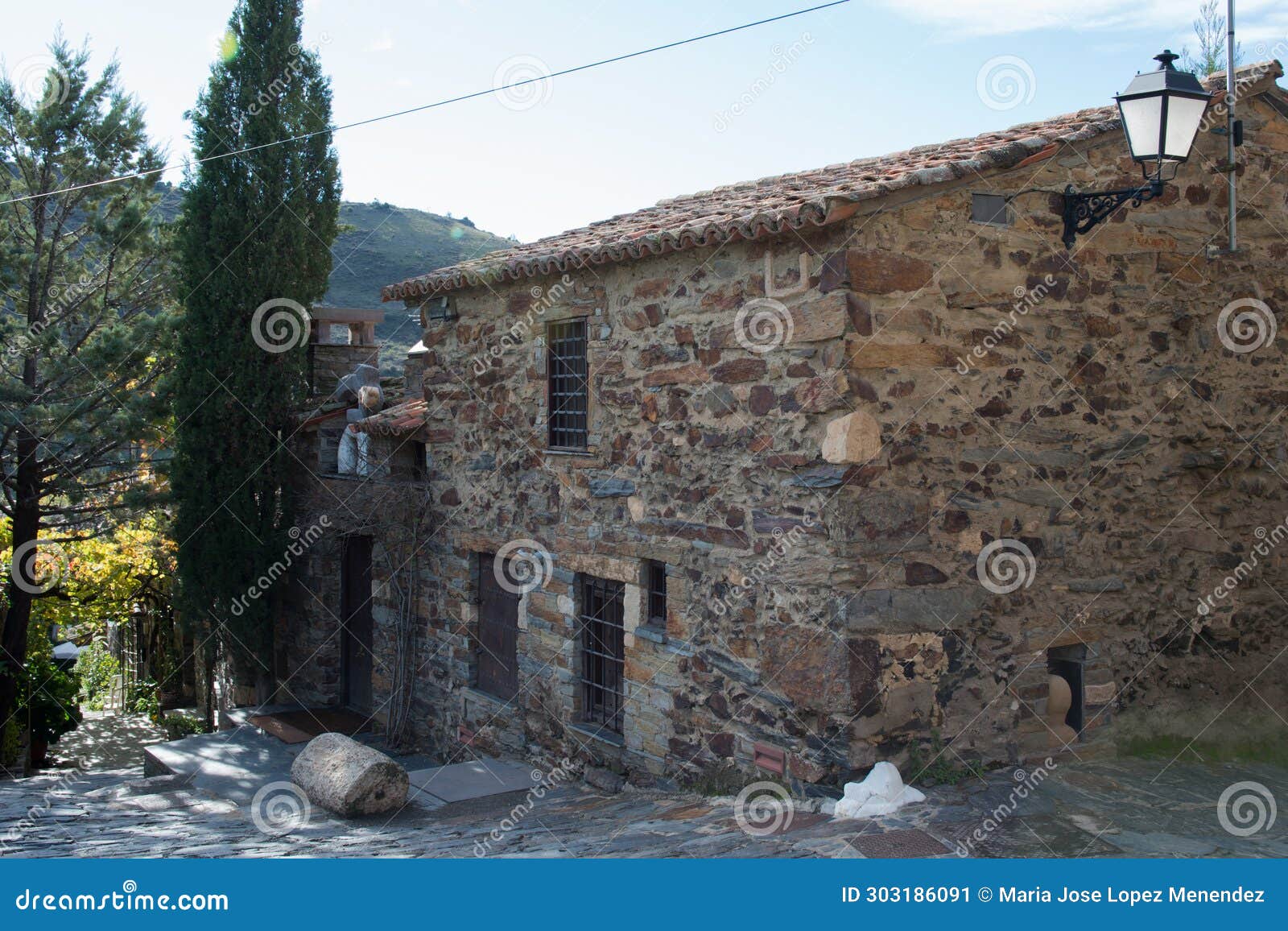 traditional stone facade in patones de arriba, madrid, spain