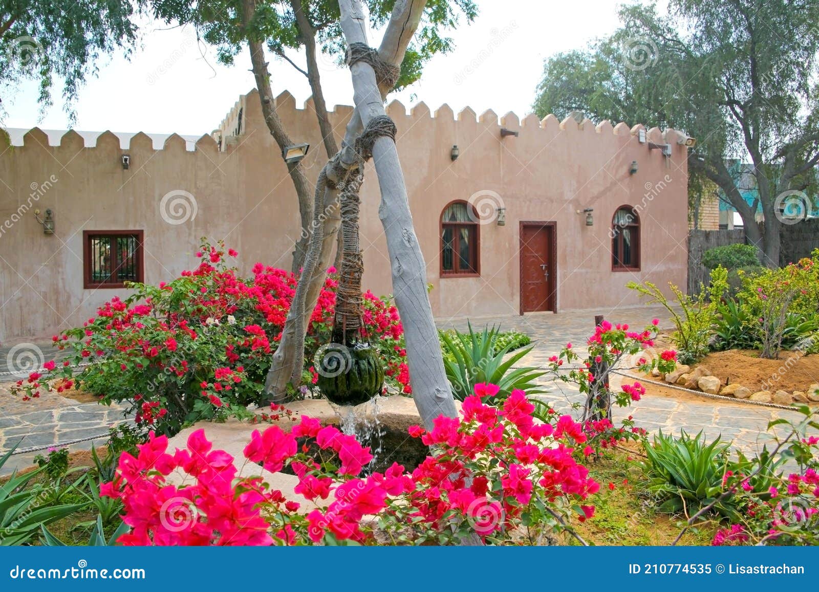 Traditional Stone House And Well In The Front Garden At The Heritage Village Abu Dhabi United Arab Emirates Stock Image - Image Of Architecture Beautiful 210774535