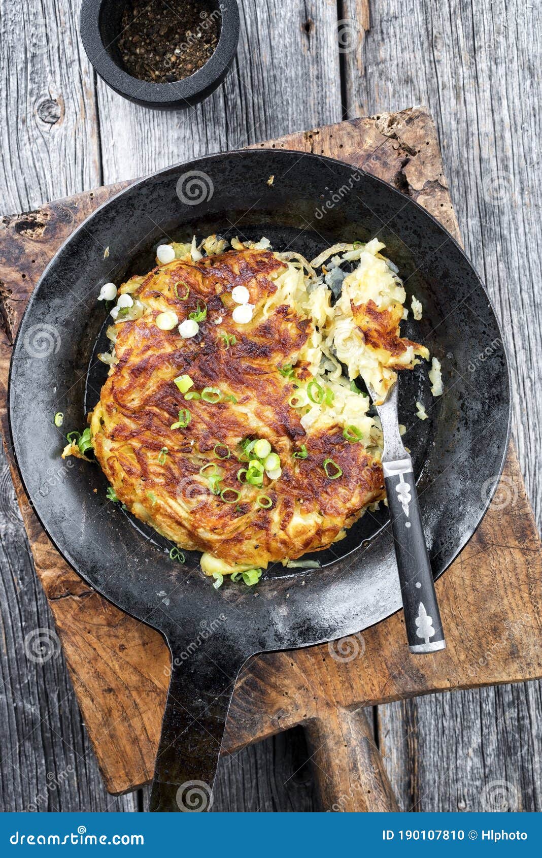 Traditional Swiss Hash Browns As Side Dish with Leek in a Wrought-iron ...