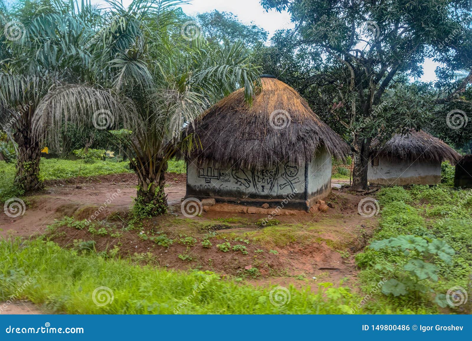 Traditional Thatched Round Mud and Clay Huts in Rural Village on the