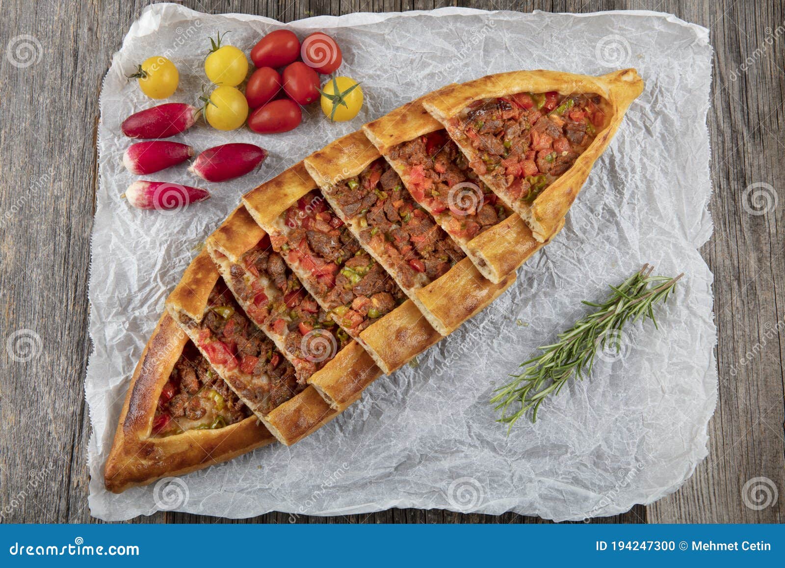 traditional turkish dish pita beef - kusbasili pide. turkish pide with cube