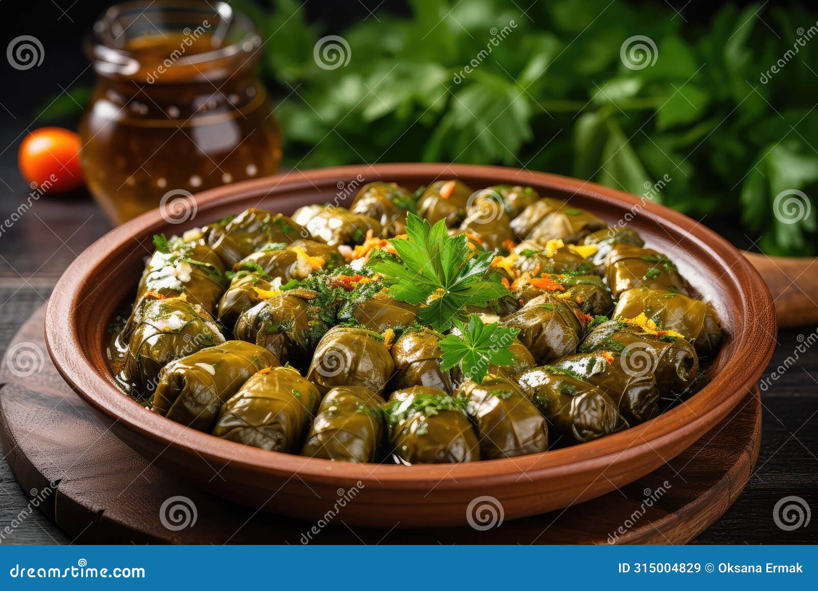 traditional turkish dolma, sarma or dolmades on wooden plate, mediterranean dish dolmadakia