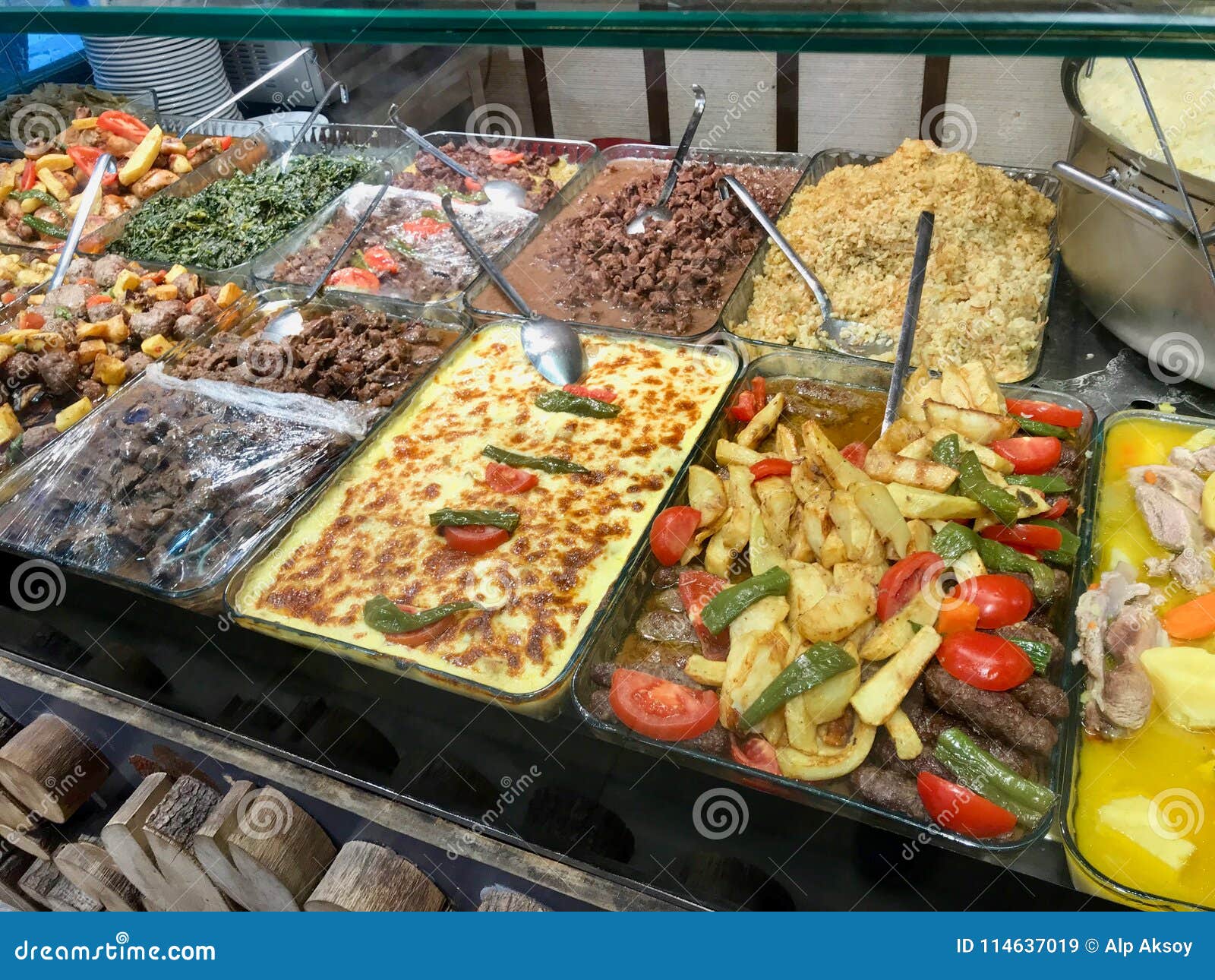 traditional turkish / karadeniz homemade foods served in big trays at restaurant for sale.