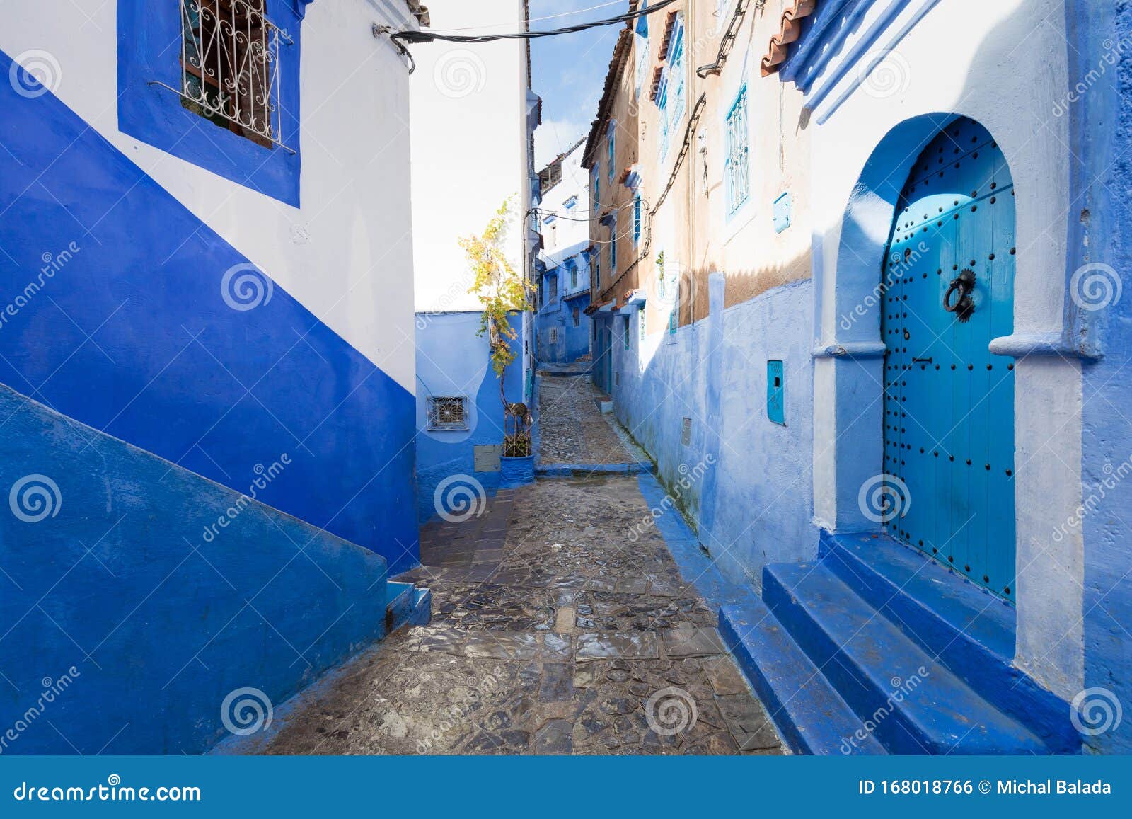 traditional typical moroccan architectural details in chefchaouen, morocco, africa beautiful street of blue medina.