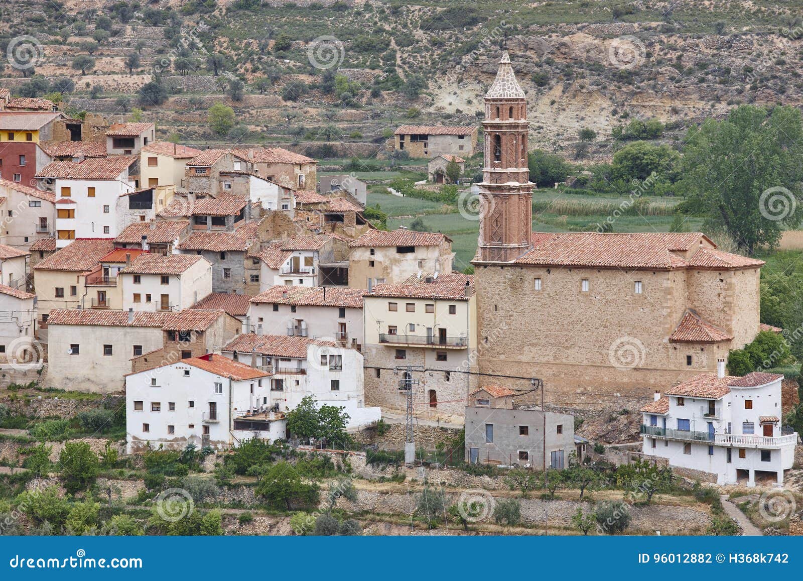traditional village with stone church. seno, teruel. spain