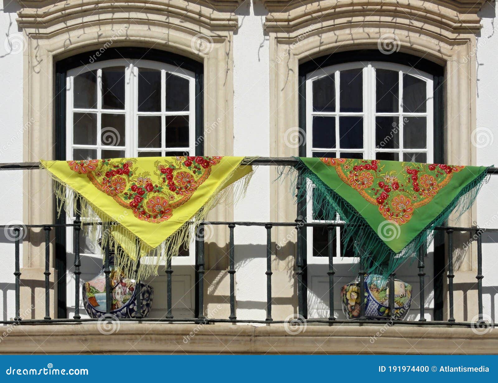 traditional windows with typical towels on the balcony