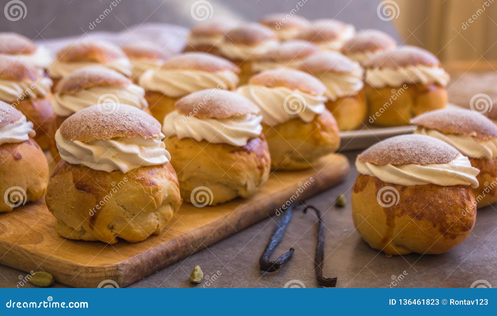 traditional winter sweet: semla semlor or fastlagsbulle flavored with cardamom, filled with almond paste & whipped cream