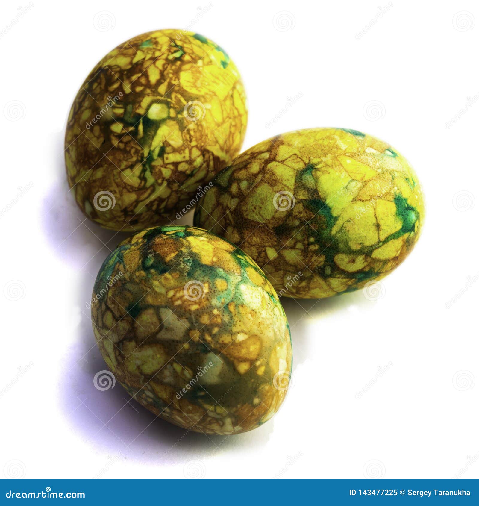 Handmade Yellow Green Easter Eggs Painted Marbled Over White Background