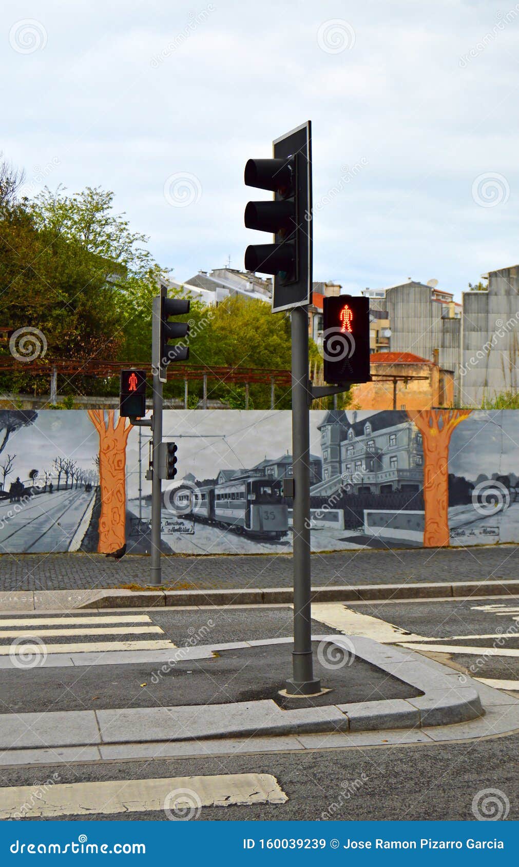 traffic light in red for pedestrians at a crossing near square praÃÂ§a de mouzinho de alburquerque in porto, portugal