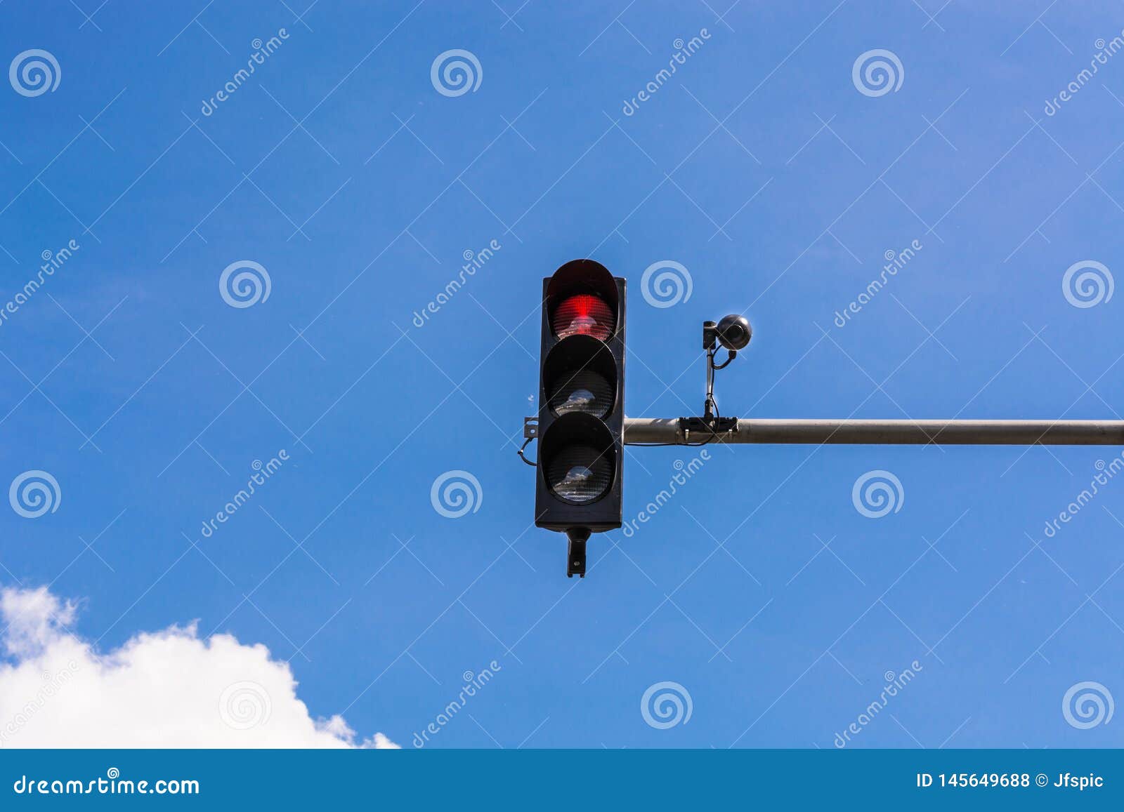 Traffic Light and a Surveillance Camera Stock Photo Image of green