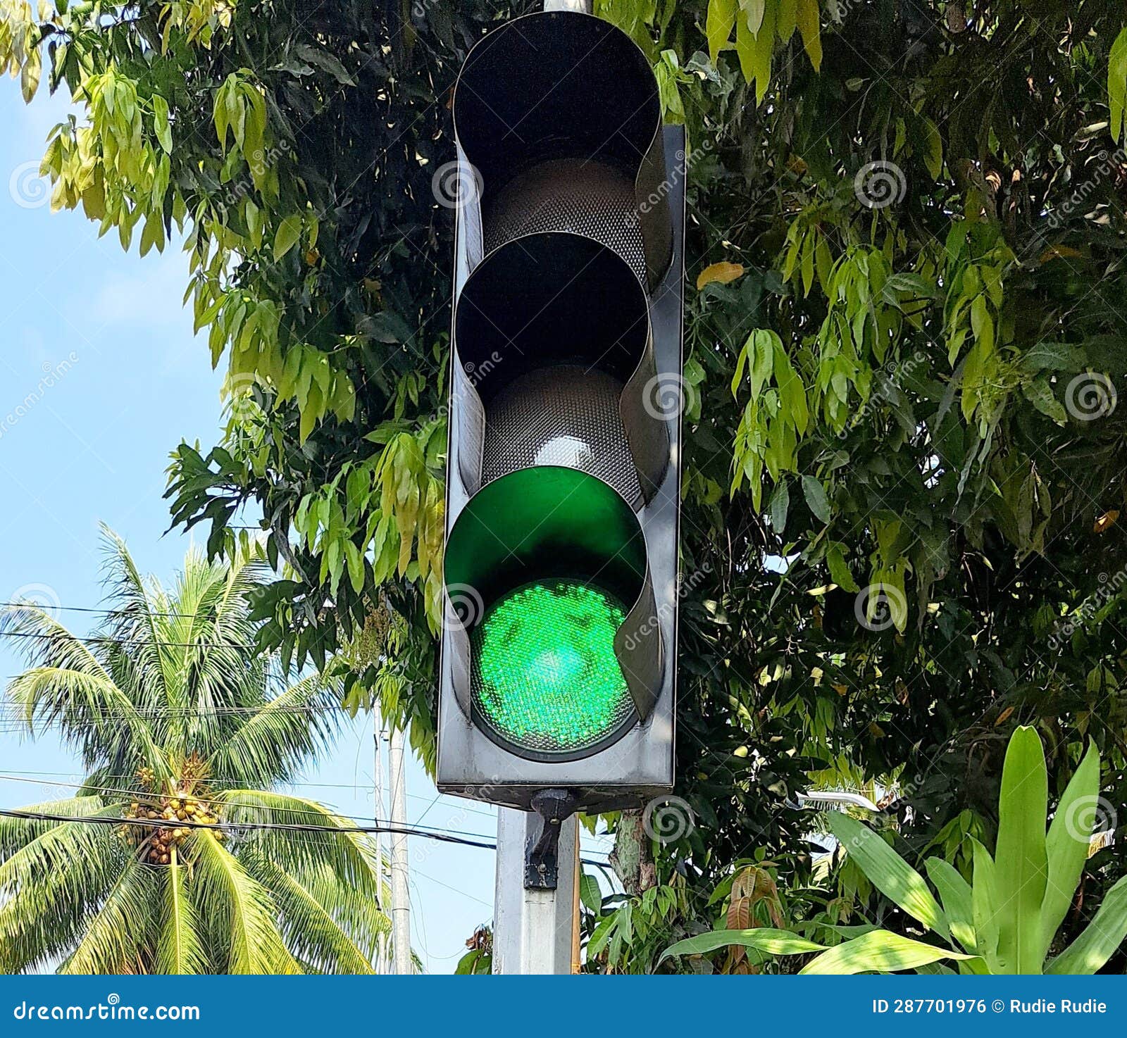 The Traffic Light is Turning Green at the Intersection Stock Photo