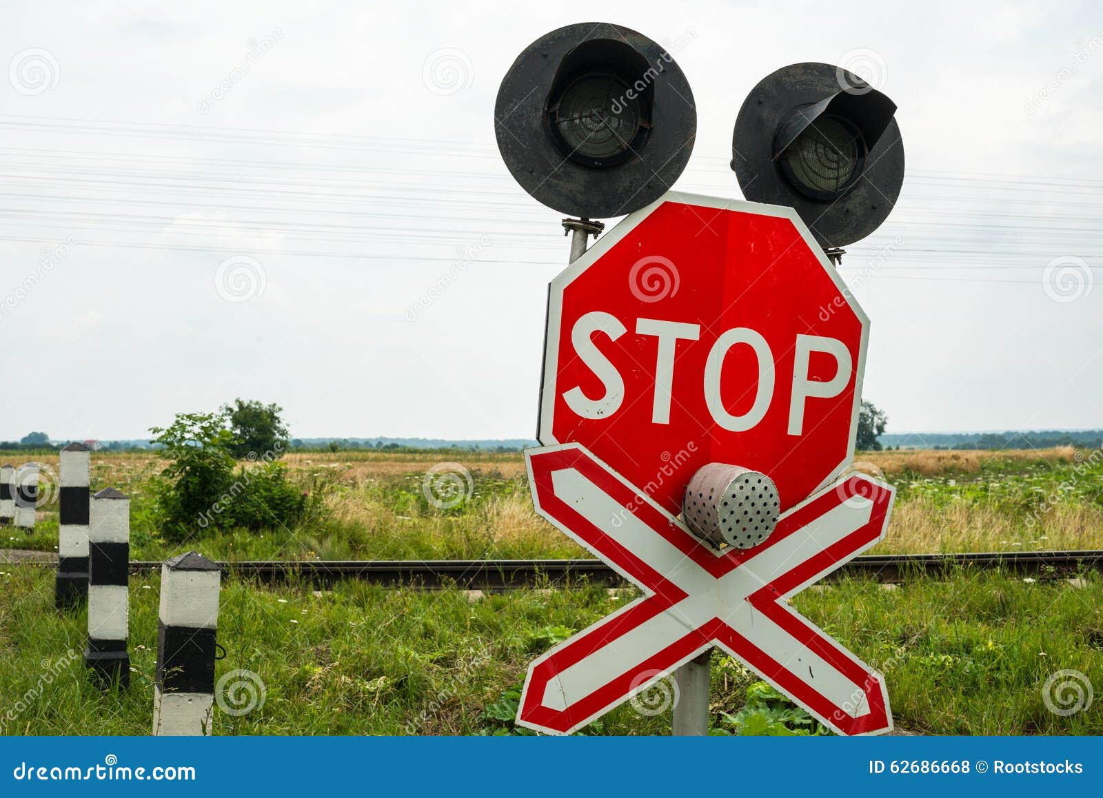 Traffic Lights And Signs At The Railroad Crossing Stock Photo - Image