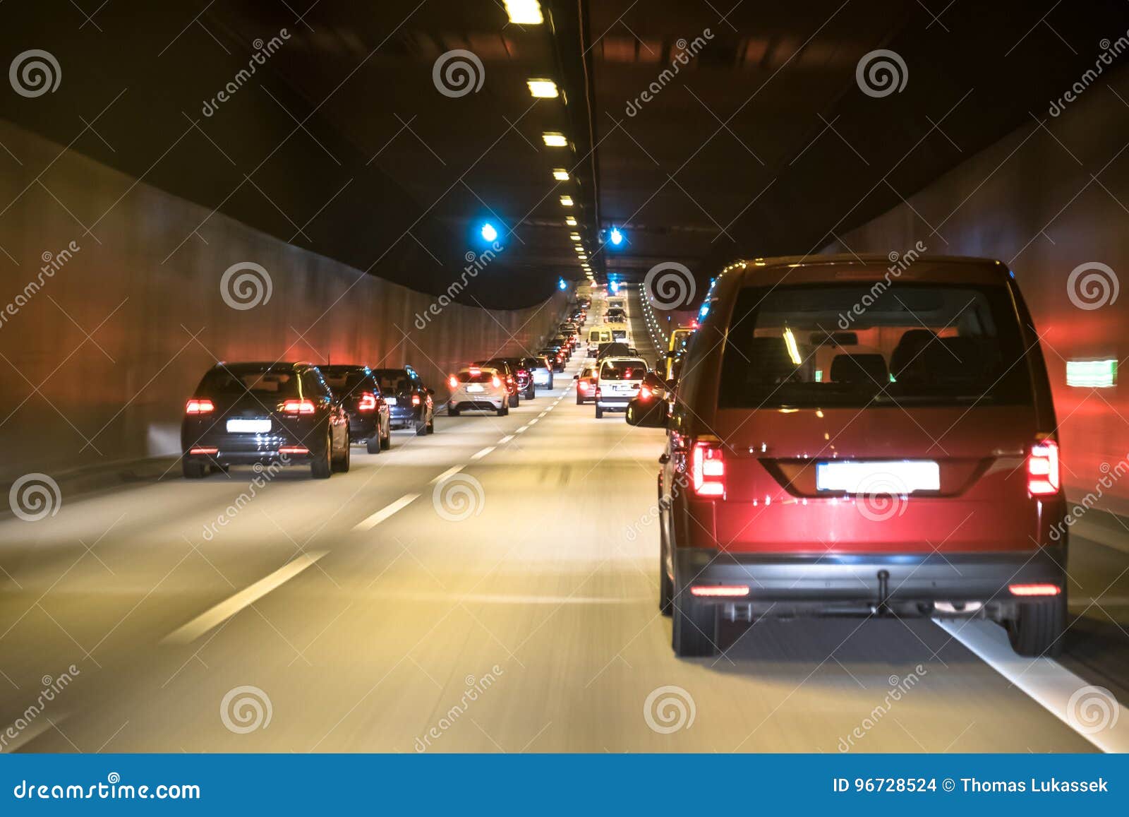 the traffic is queing in the elbtunnel of the city of hamburg