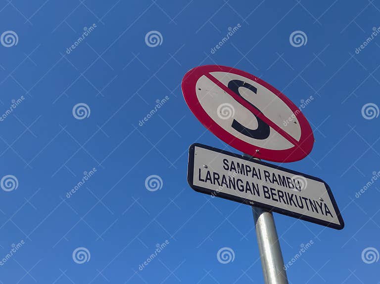 A Traffic Sign with a Statement that it is Forbidden To Stop Stock Image Image of icon, lane