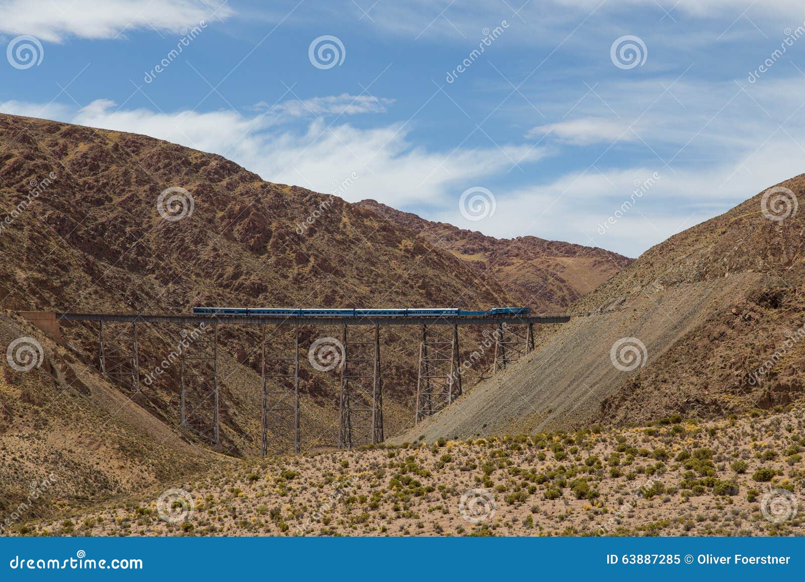 train driving over polvorilla viaduct in argentina