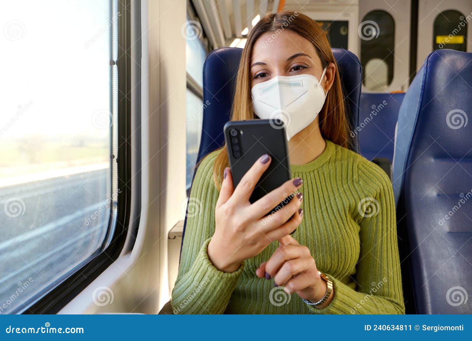 Train Passenger Using Smartphone App during Travel Commute Wearing