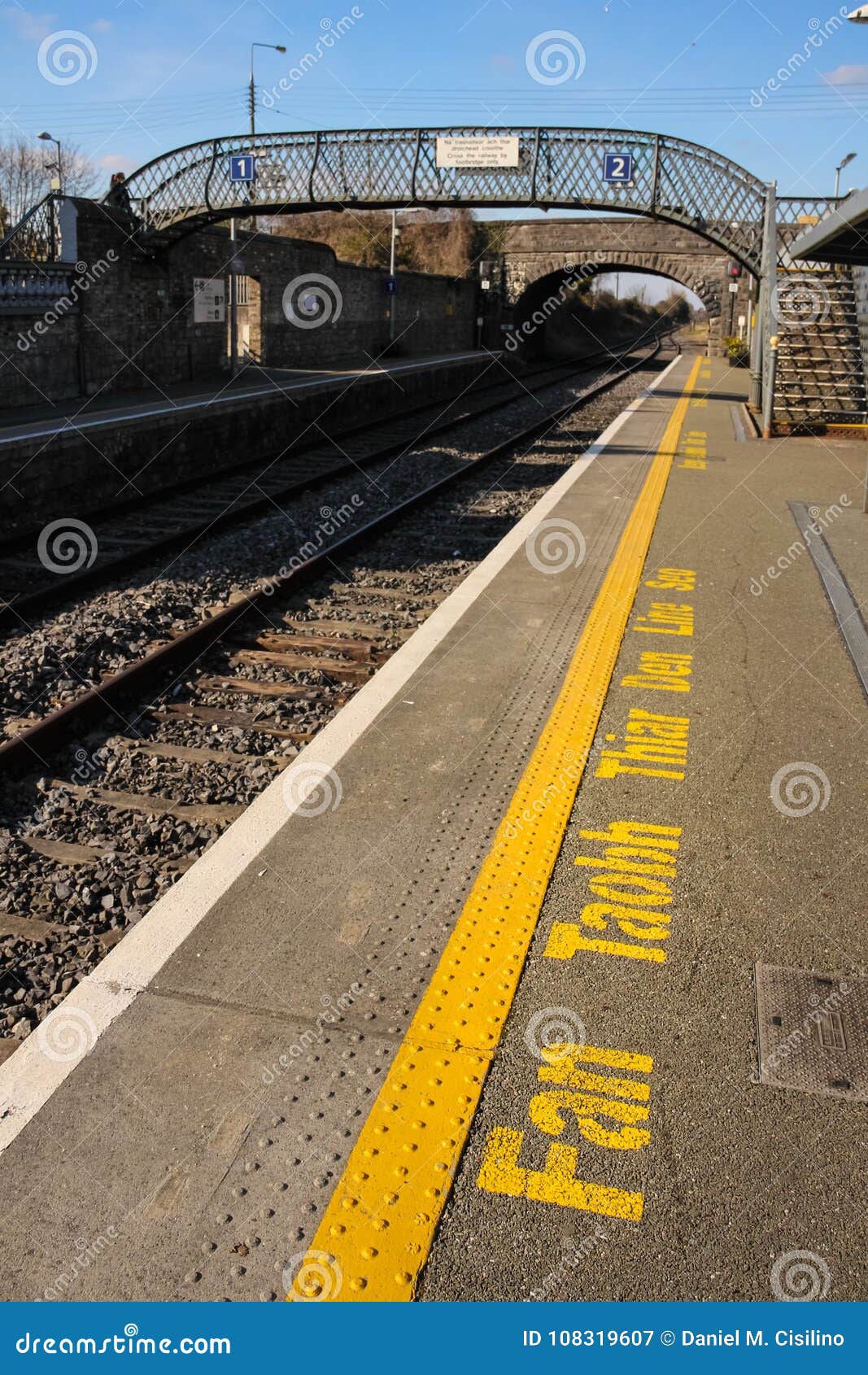 train station. warning message in irish. athy. ireland
