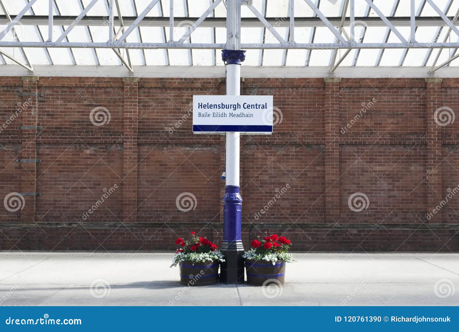 train station sign brick wall railway central london